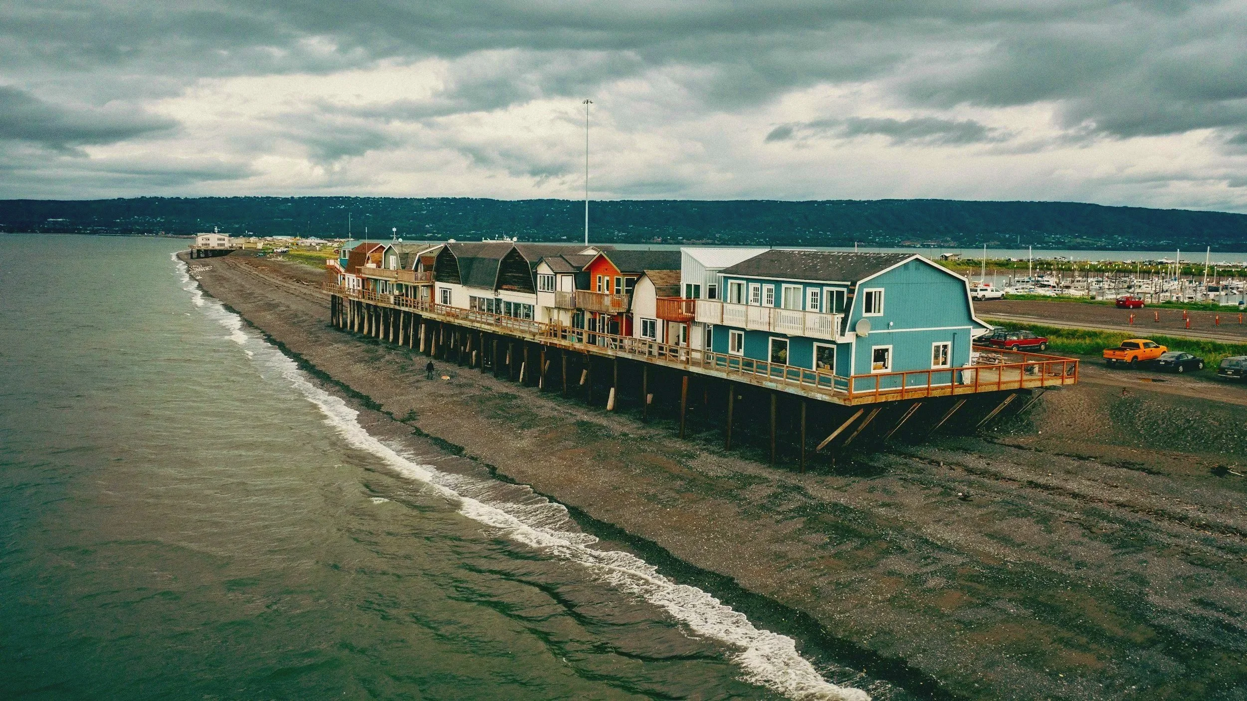 Colorful boardwalk shops on the Homer Spit along Kachemak Bay, Alaska
