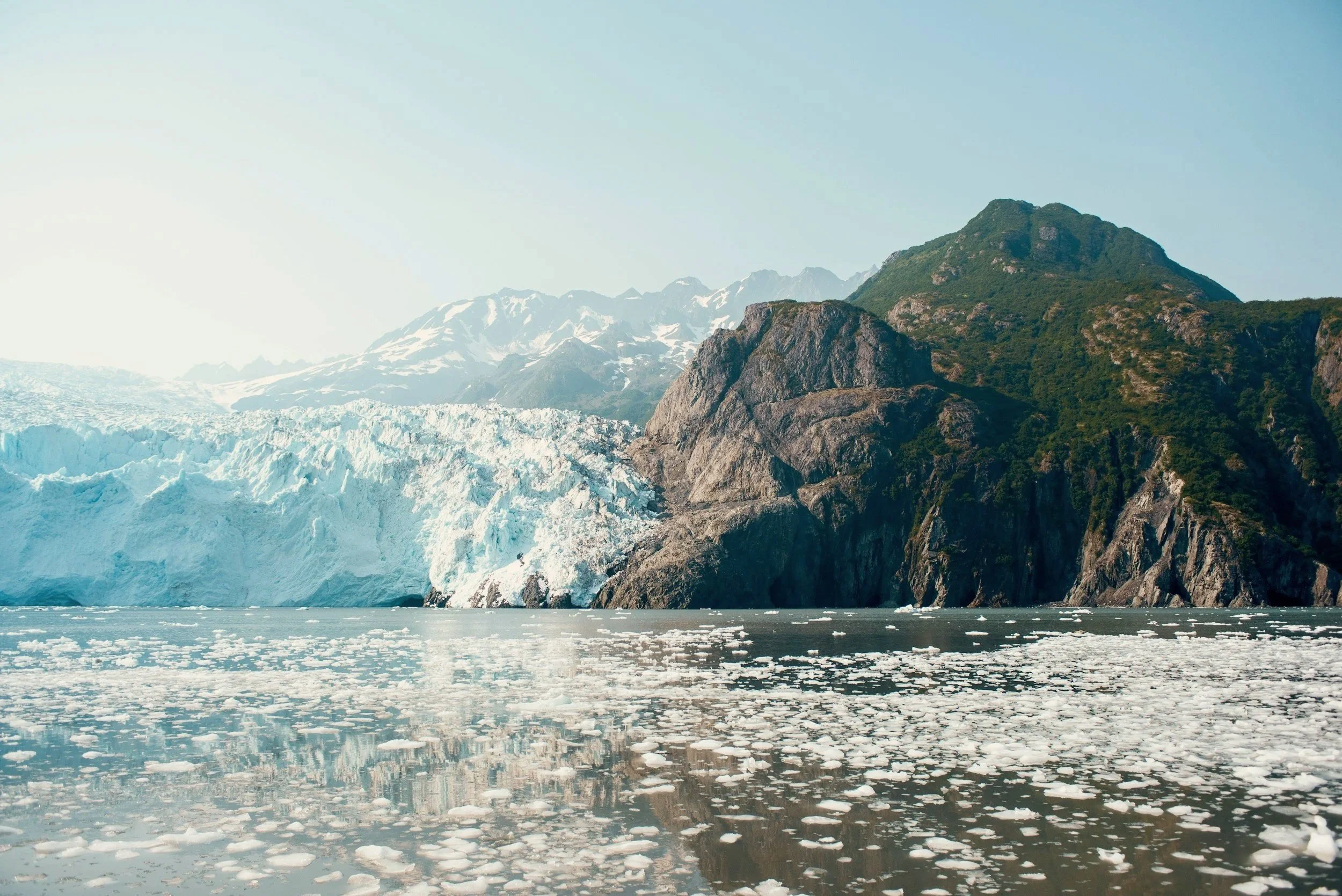 Tidewater glacier meeting the sea in Kenai Fjords National Park near Seward, Alaska