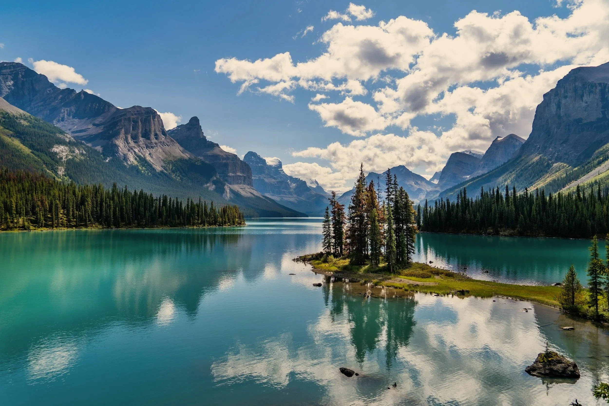 Spirit Island on Maligne Lake framed by the peaks of Jasper National Park, Alberta