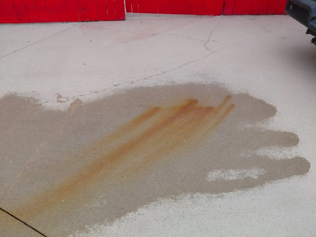 A rust stain at a water park in Roanoke right before we removed it.