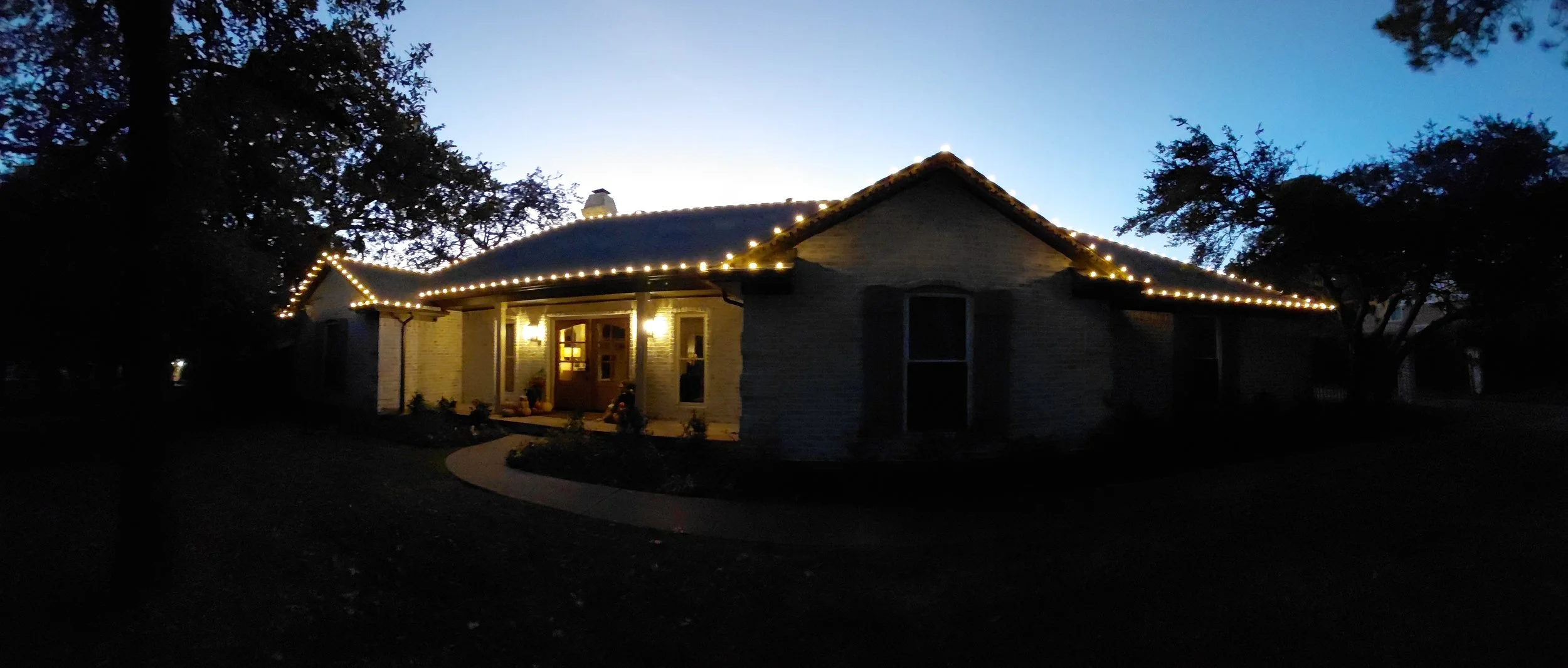 Christmas lights installed on a home in Double Oak, TX.