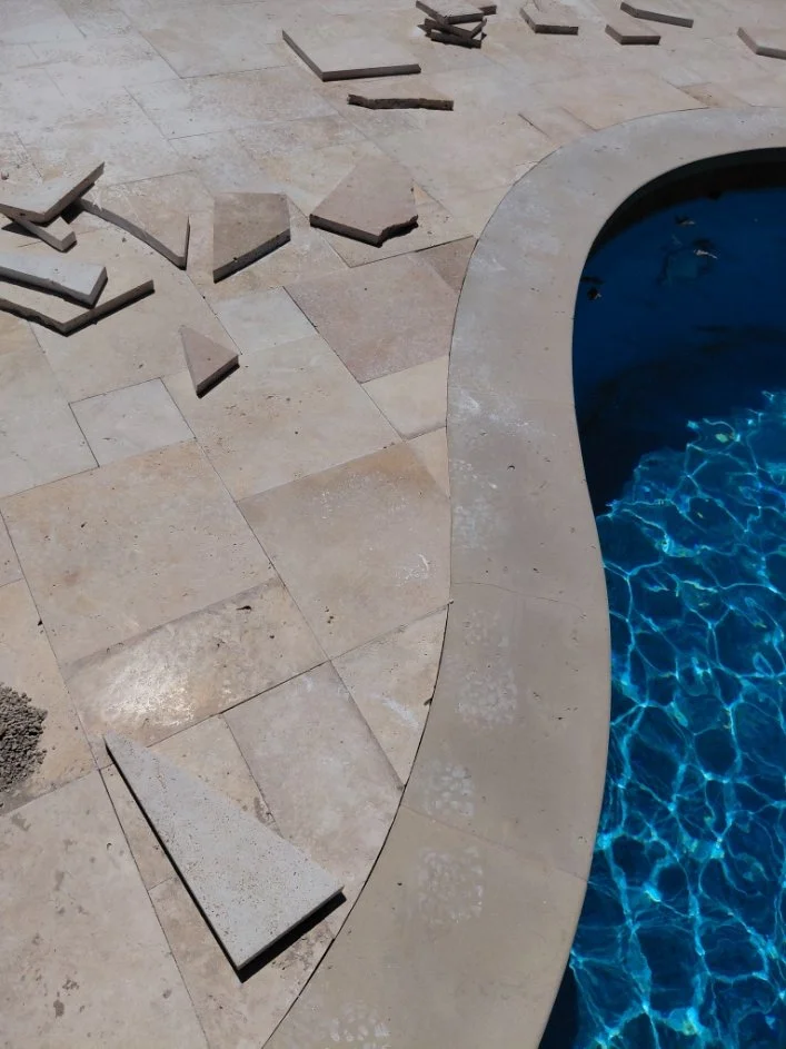 Detailed view of work in progress on large pool deck in Westlake Texas