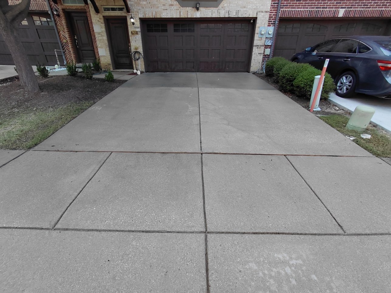 Freshly pressure washed driveway near Southlake.