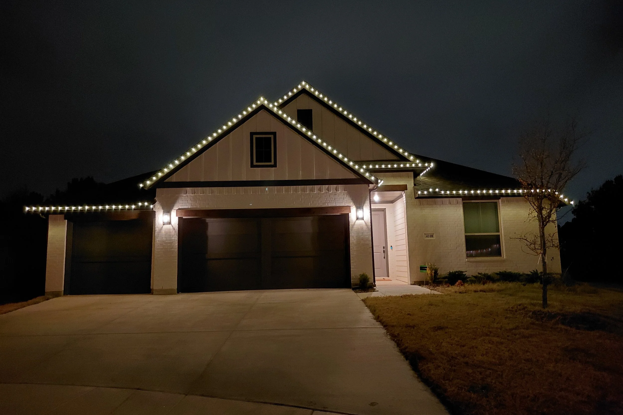 Christmas lights installed on a home near Denton, TX.