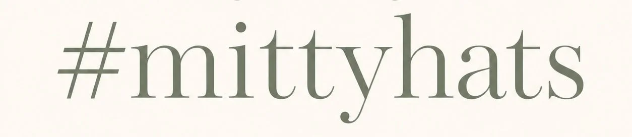 The text '# mittyhats' written in large, green font on a cream background.