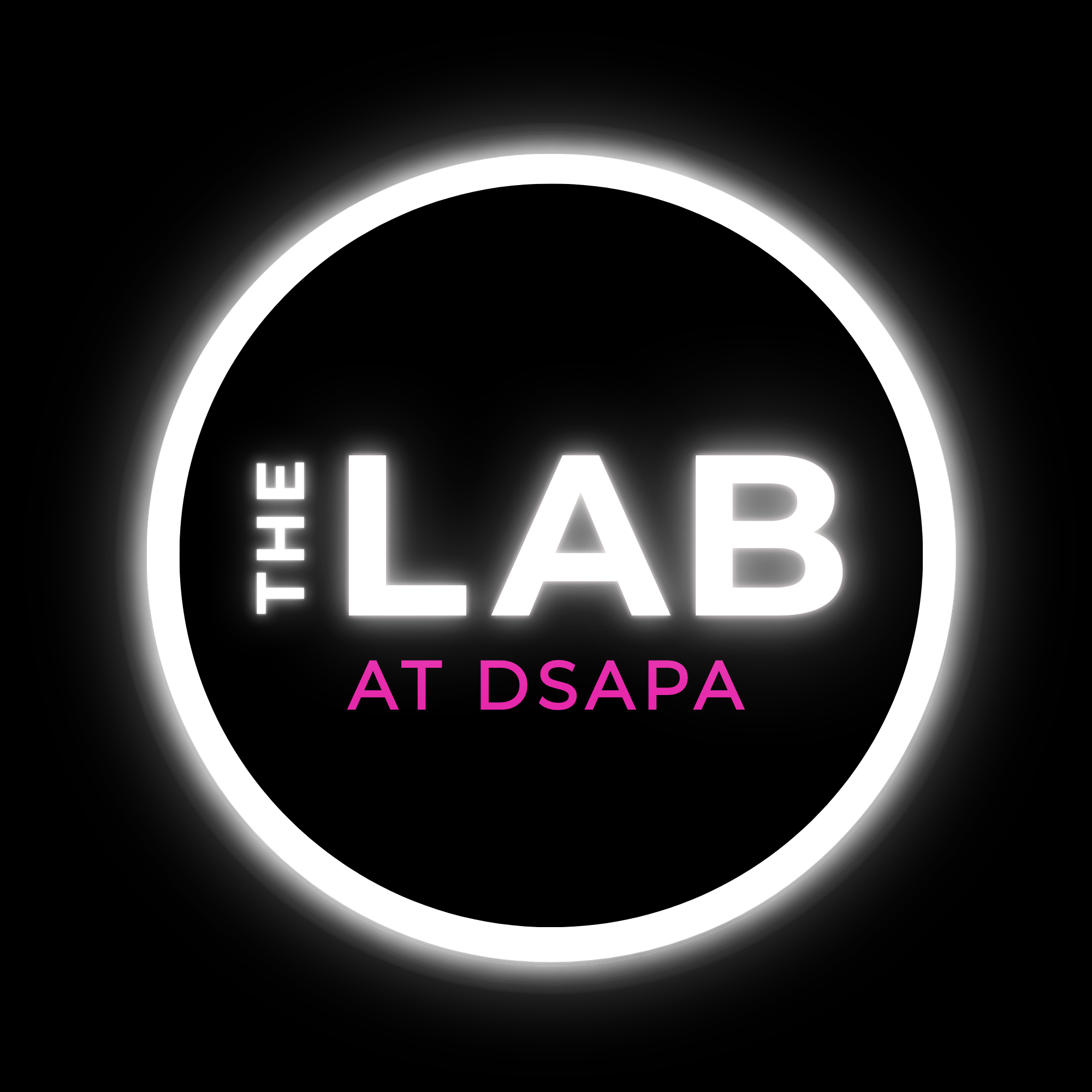 Neon sign displaying the word "THE LAB AT DSAPA" in white and pink text against a black background.