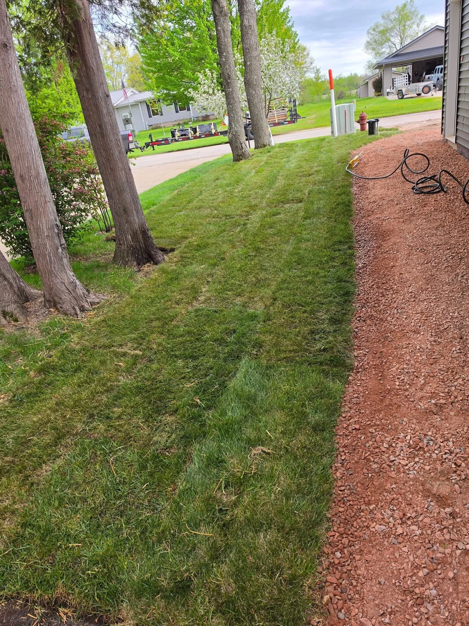 Gravel walkway trees — Gravel walkway and lawn installation alongside house by Ground & Grid Solutions