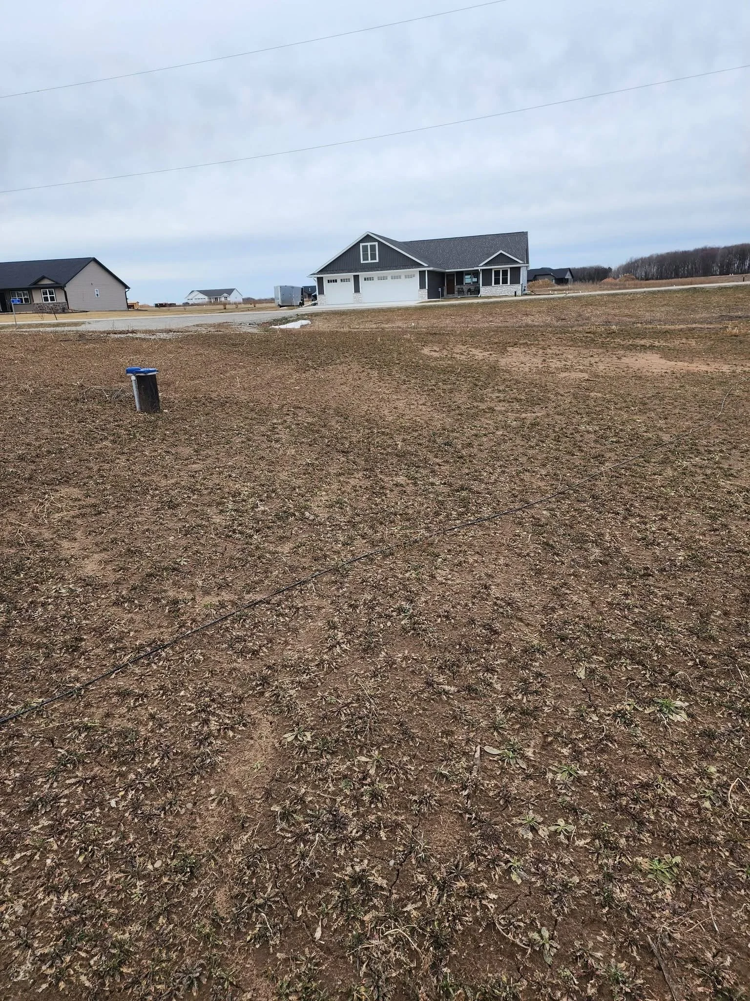 Graded lot — graded lot before lawn installation by Ground & Grid Solutions Northeast Wisconsin