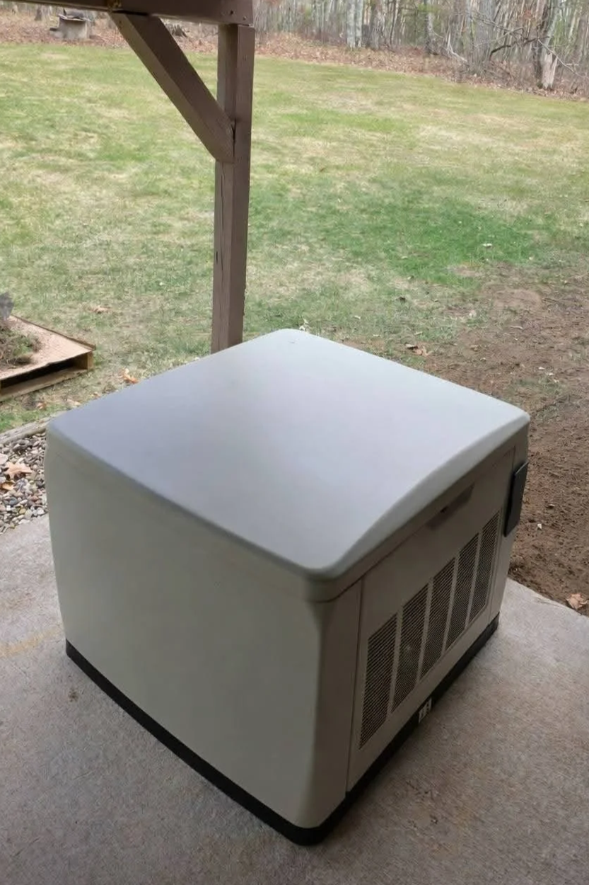 Generator under porch — Standby home generator installed under covered porch by Ground & Grid Solutions