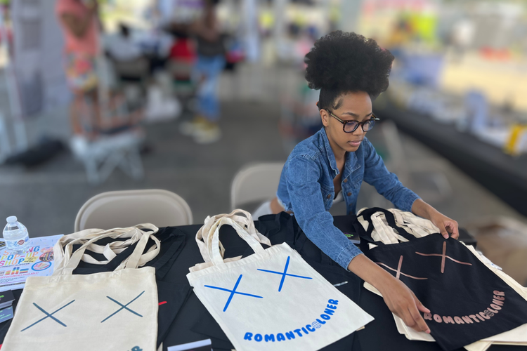 Student entrepreneur selling youth-made products