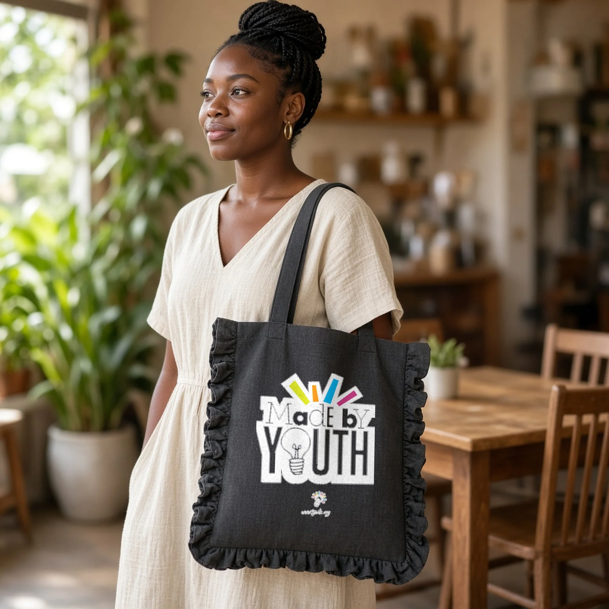 MBY-BAG_faire-hok-ruffle-tote_black-grey_04_lifestyle-carried_CONCEPTUAL_2000x2000_AI_MOCKUP_v2.jpg