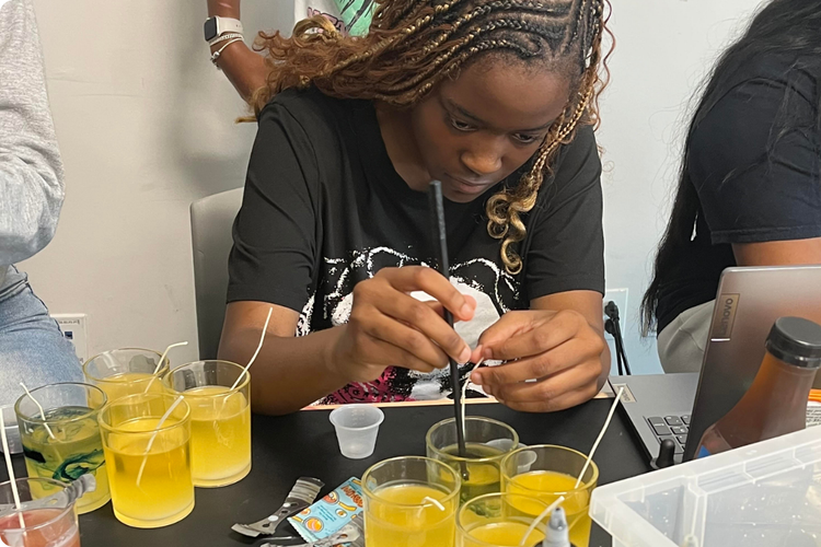 Youth participating in hands-on YEI programming