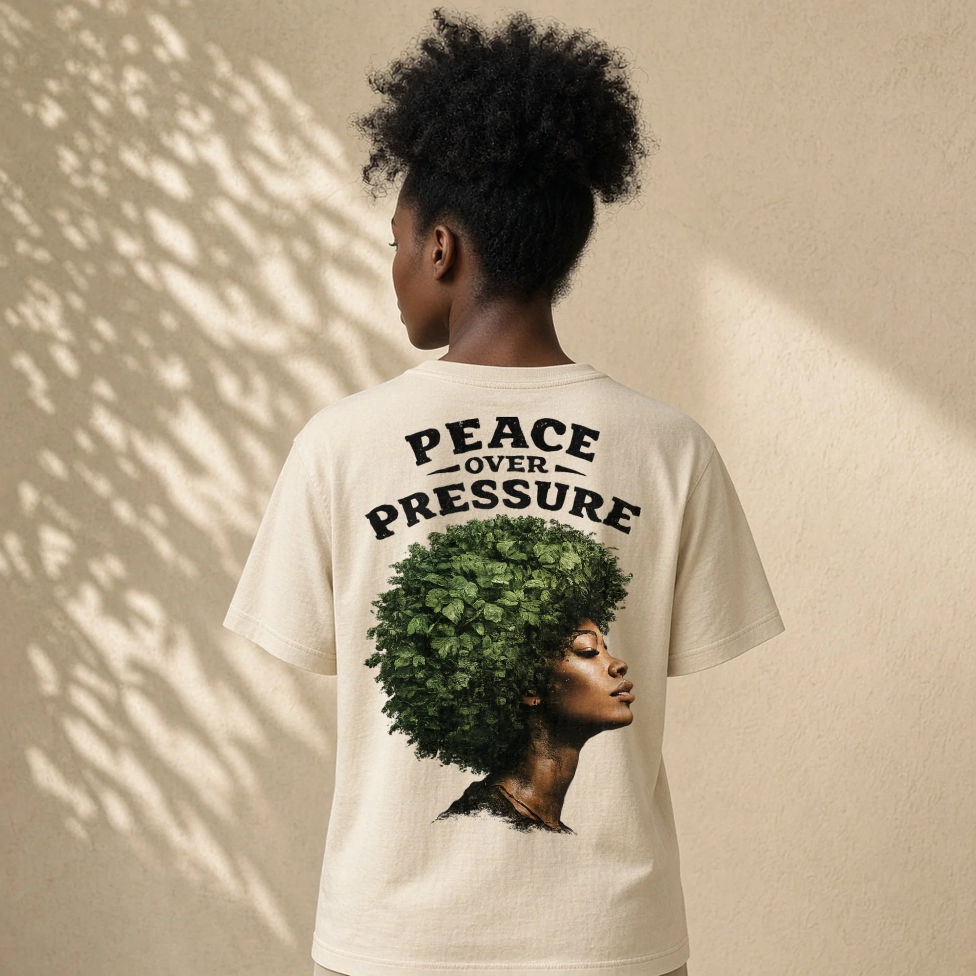 2026-10-21_DP-SHIRT_peace-over-pressure_faded-cream_04_lifestyle-back-view_CONCEPTUAL_2000x2000_AI_MOCKUP.jpg