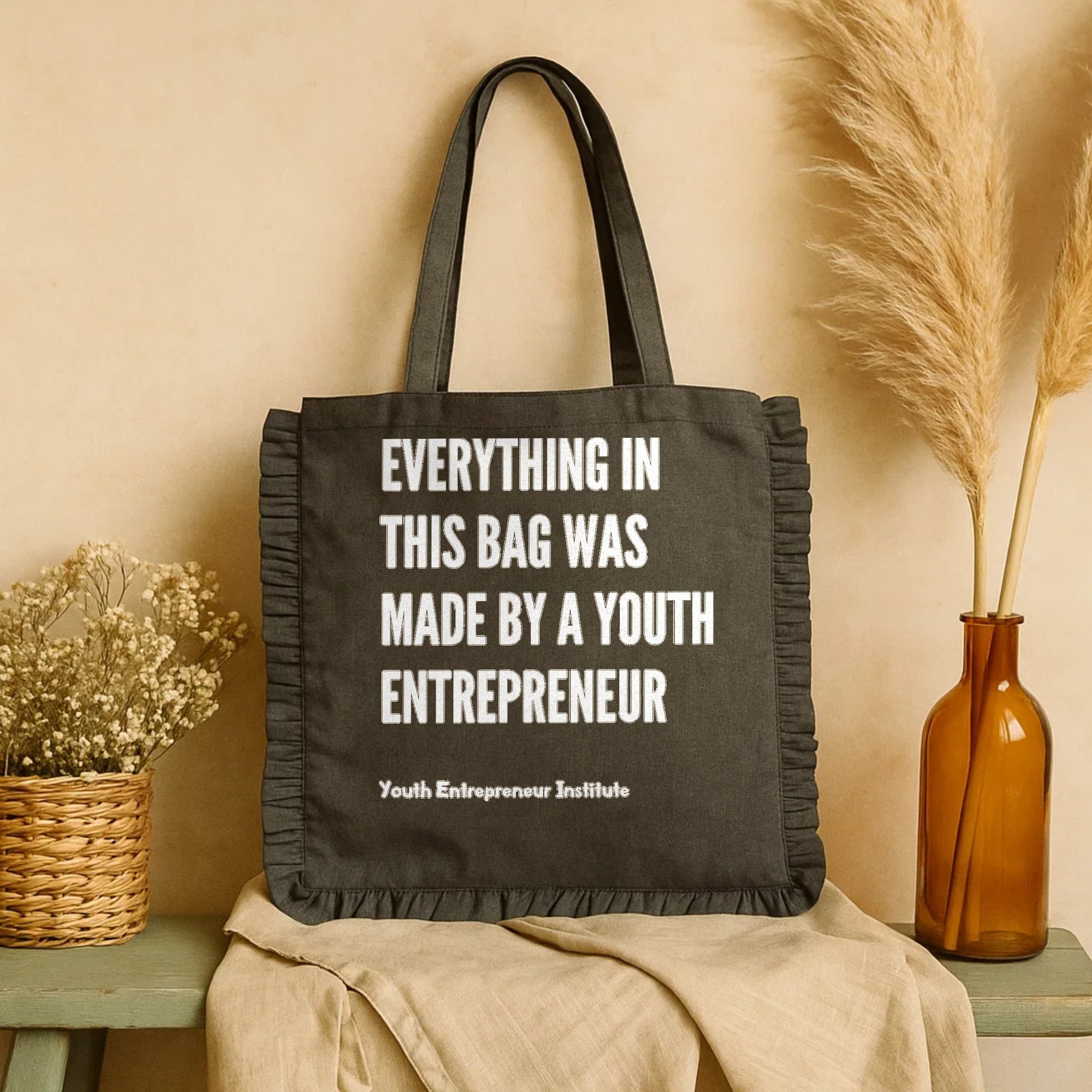 MBY-BAG_faire-hok-ruffle-tote_black-grey_02_back_everything-in-this-bag-text_2000x2000_COMPOSITE_MOCKUP.jpg