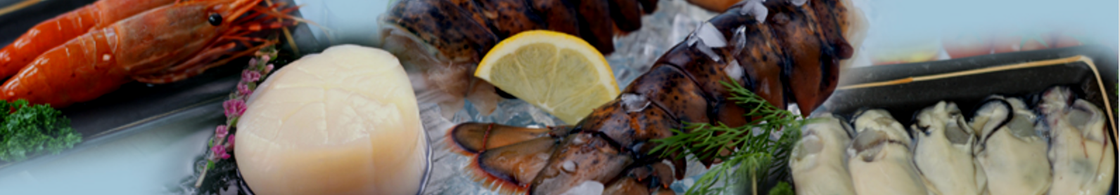 Various seafood including lobster, oysters, and a lemon wedge on a bed of ice, garnished with herbs.