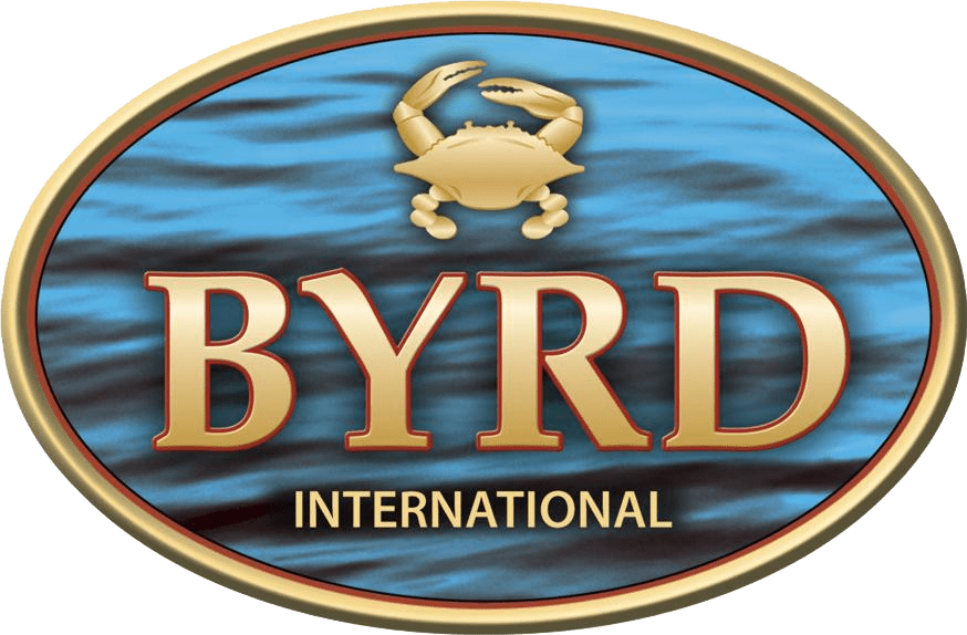 An oval logo with a gold border, featuring a crab above the text 'BYRD' in large red letters with a gold outline, and 'INTERNATIONAL' below in smaller gold letters, set against a blue background with water ripples.