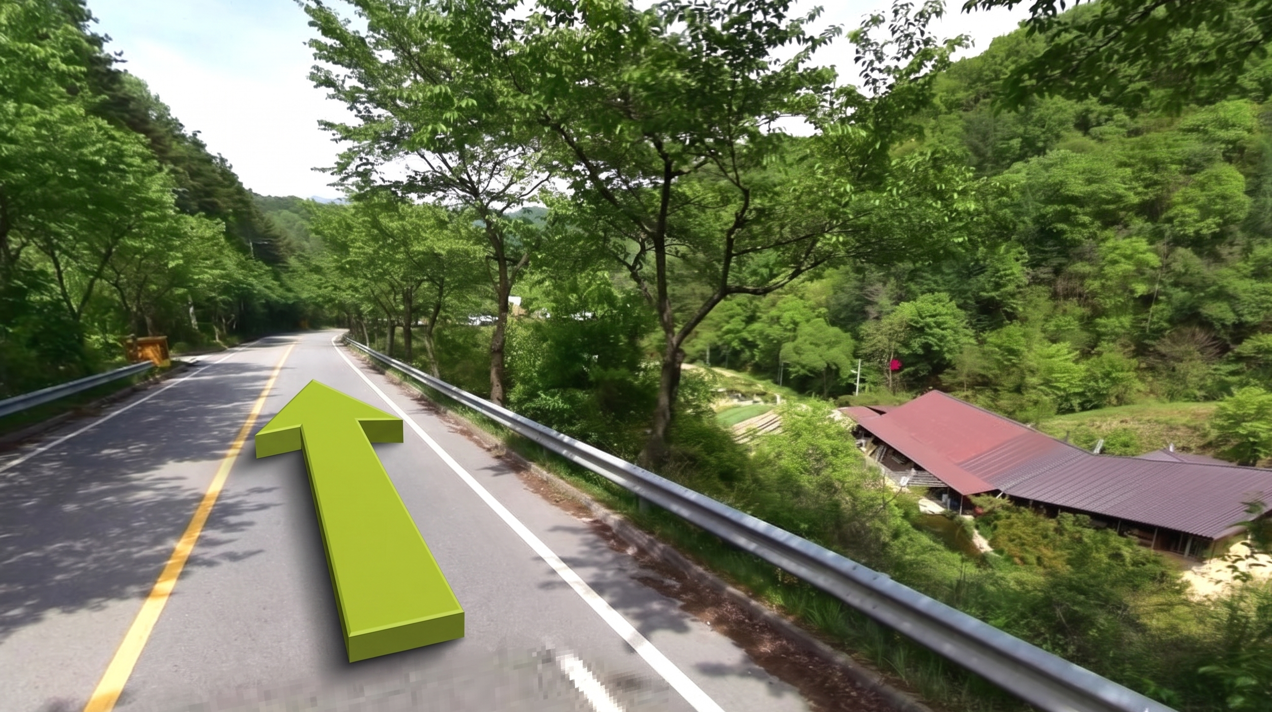 A winding mountain road surrounded by lush green trees, with a house with a red roof on the right side and a small garden visible below.