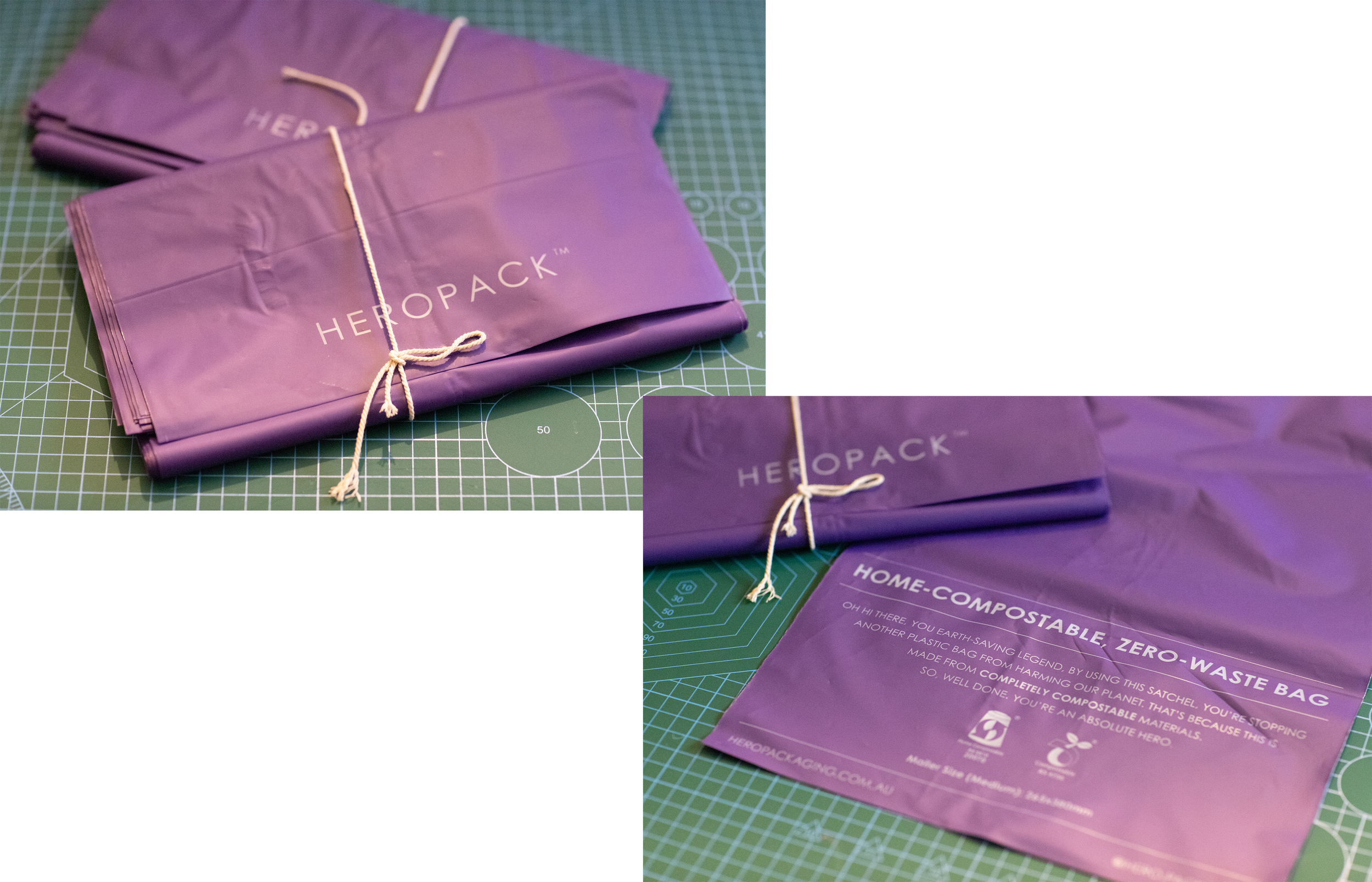 Several purple HERO PACK trash bags tied with a white string, placed on a green cutting mat.