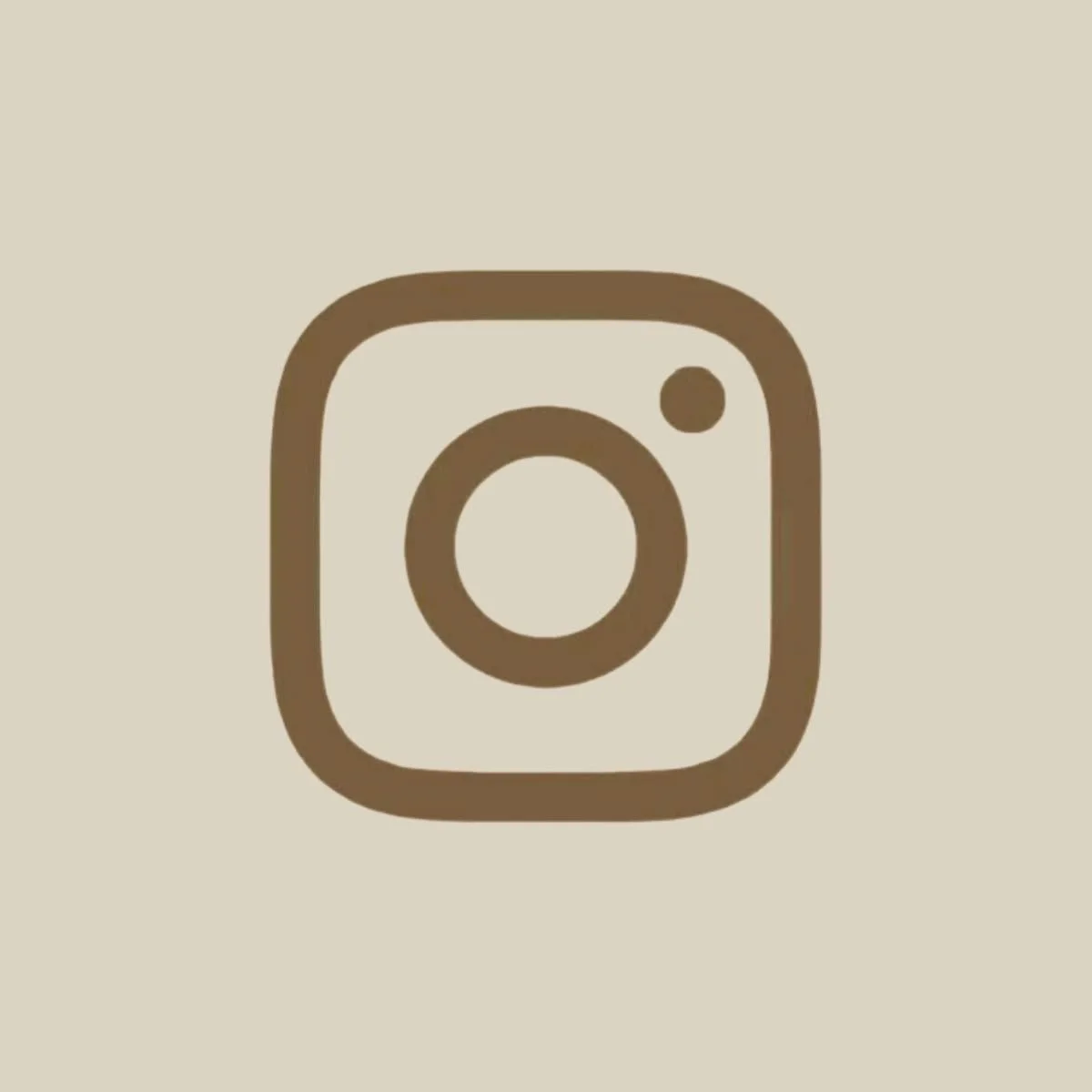 Brown Instagram logo on a light beige background.