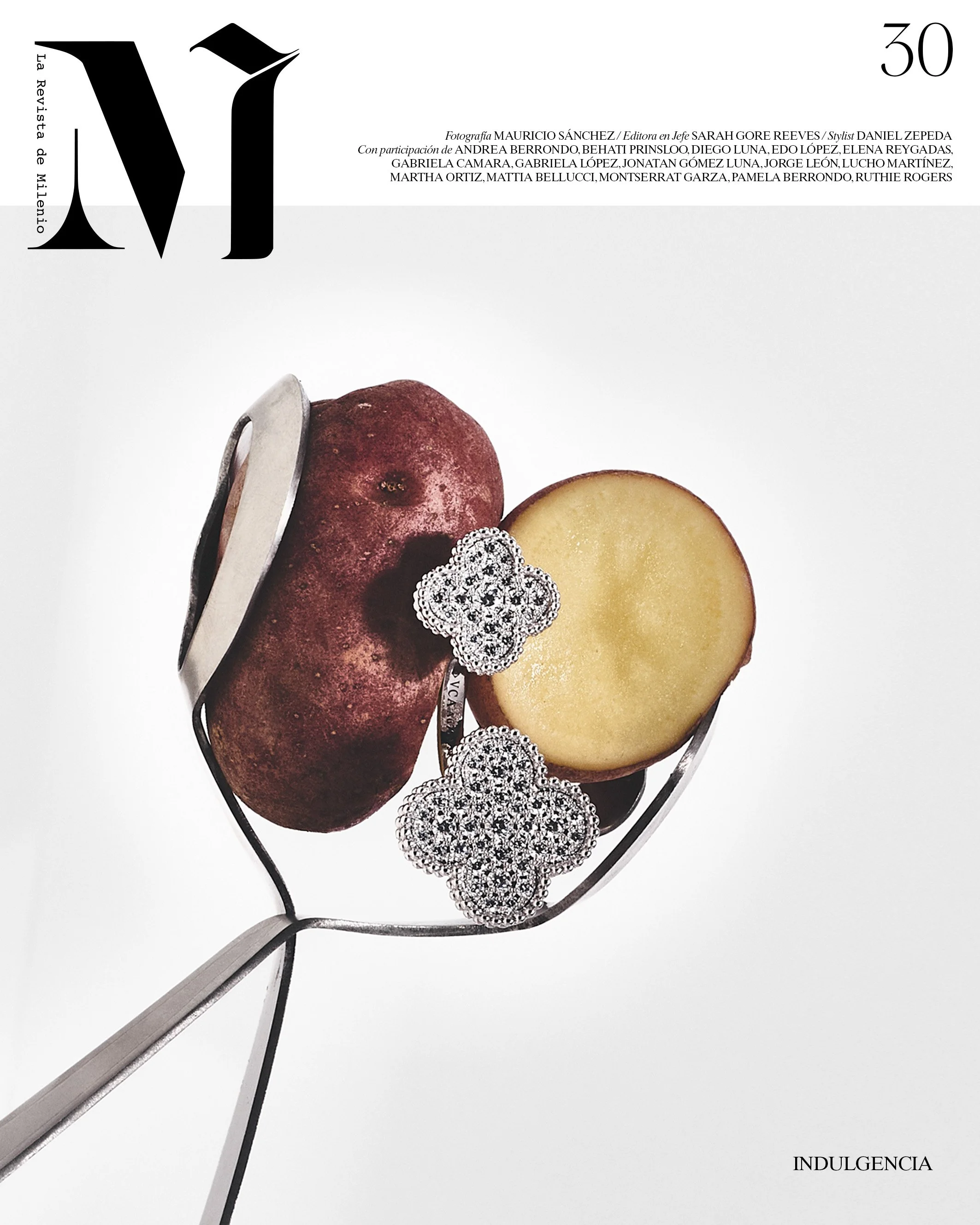 Portada de revista con letras grandes y negras, muestra frutas, joyas y el texto 'Indulgencia' en la esquina inferior derecha, con invitación a la revista de mi mundo.