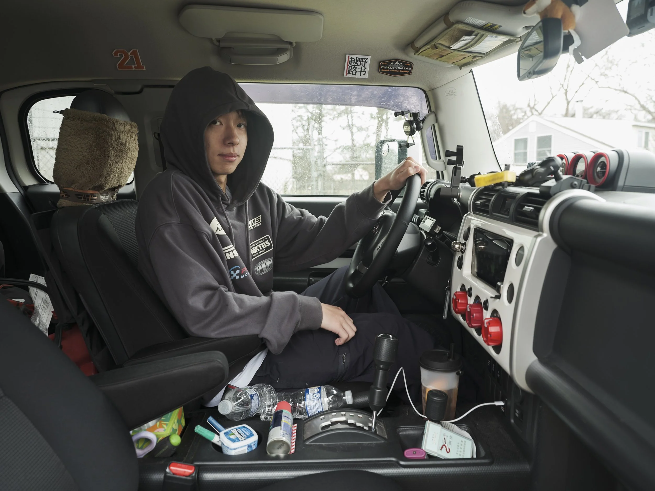 Young Dumbs behind Steering wheels