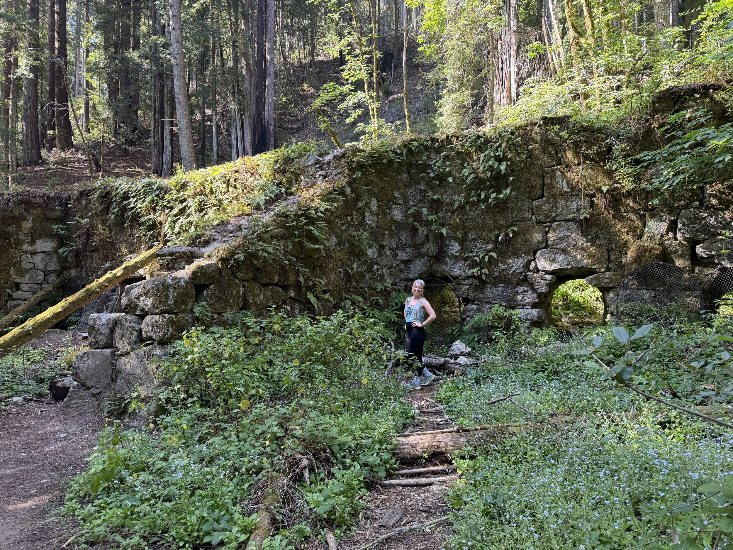 A woman trail running, hiking, athlete, sports chiropractic, rehab for outdoor athletes.