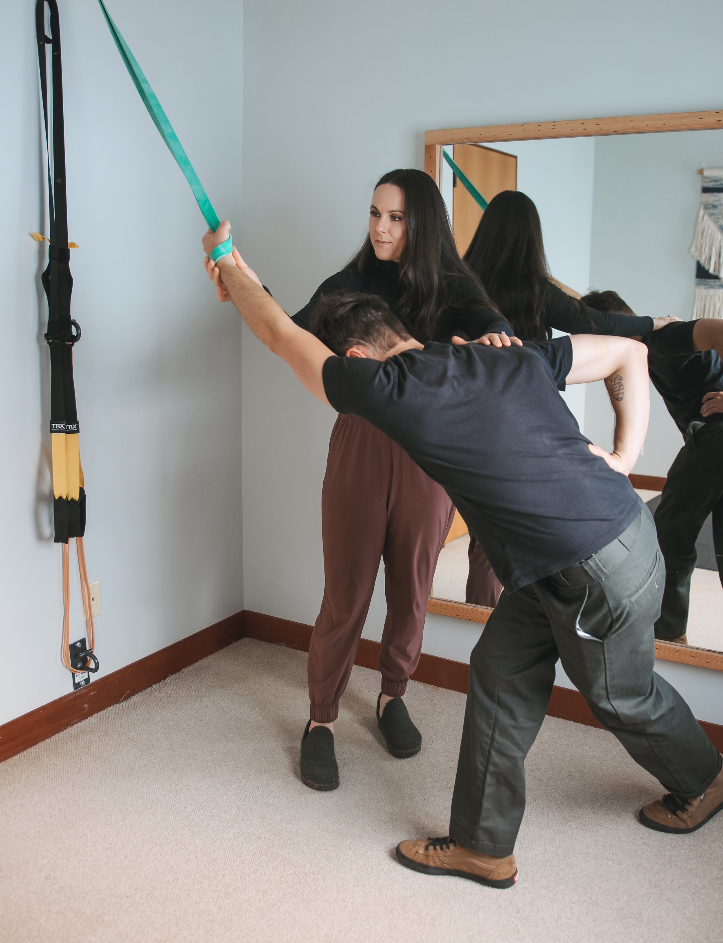 Banded Shoulder mobility stretch sports chiropractic