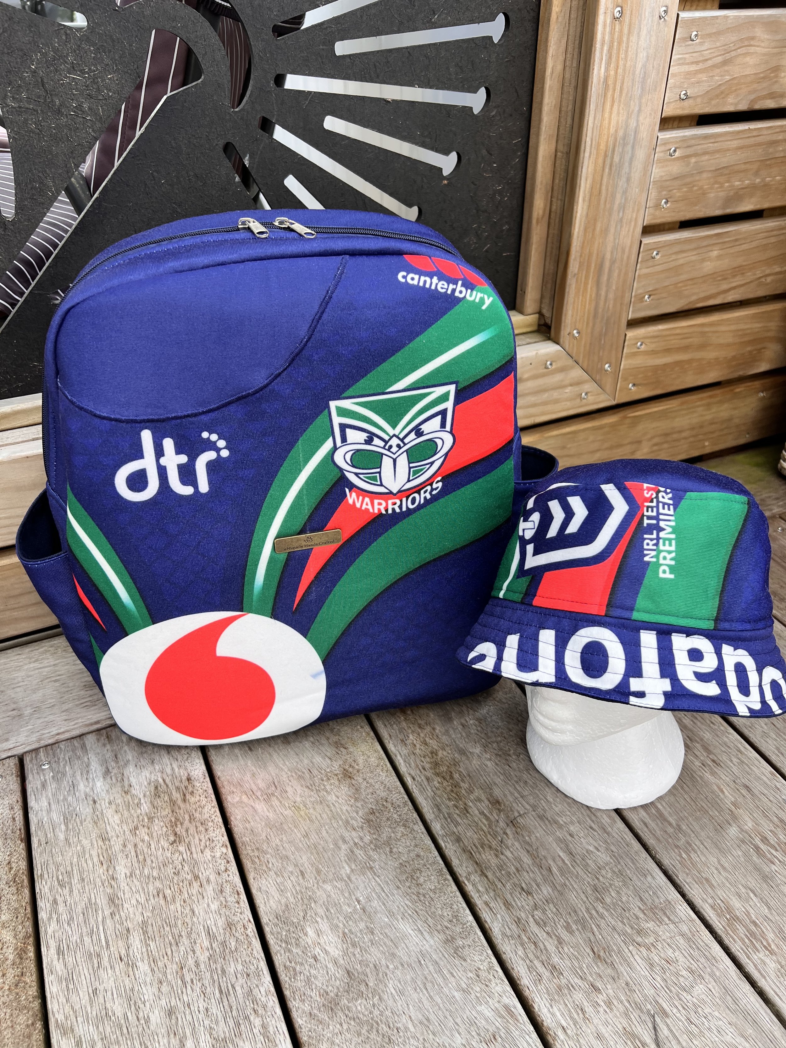 Handcrafted bag created from a treasured New Zealand Warriors rugby league jersey, preserving the original team colours, logos and jersey details