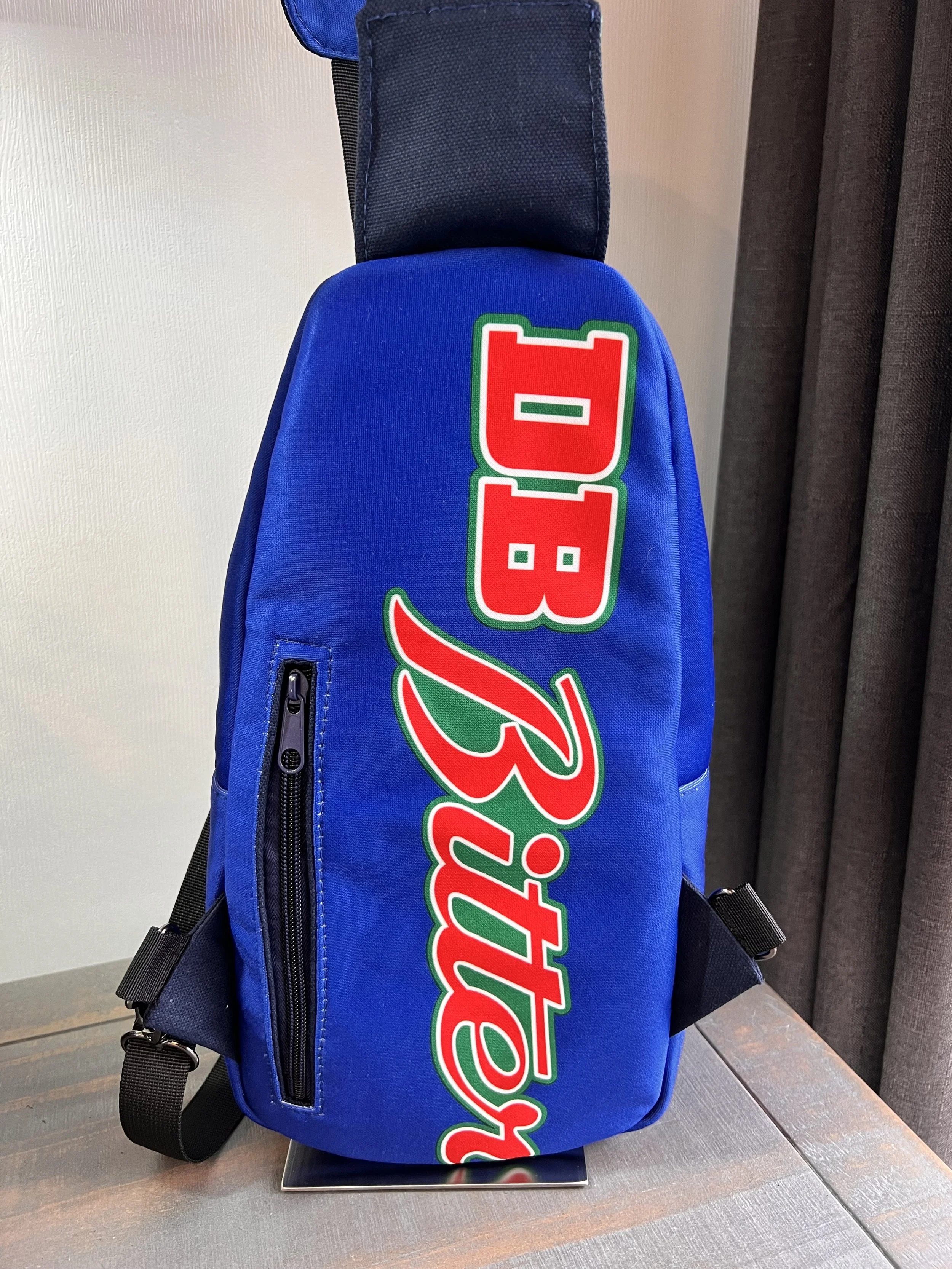 Handcrafted bag created from a treasured New Zealand Warriors rugby league jersey, preserving the original team colours, logos and jersey details