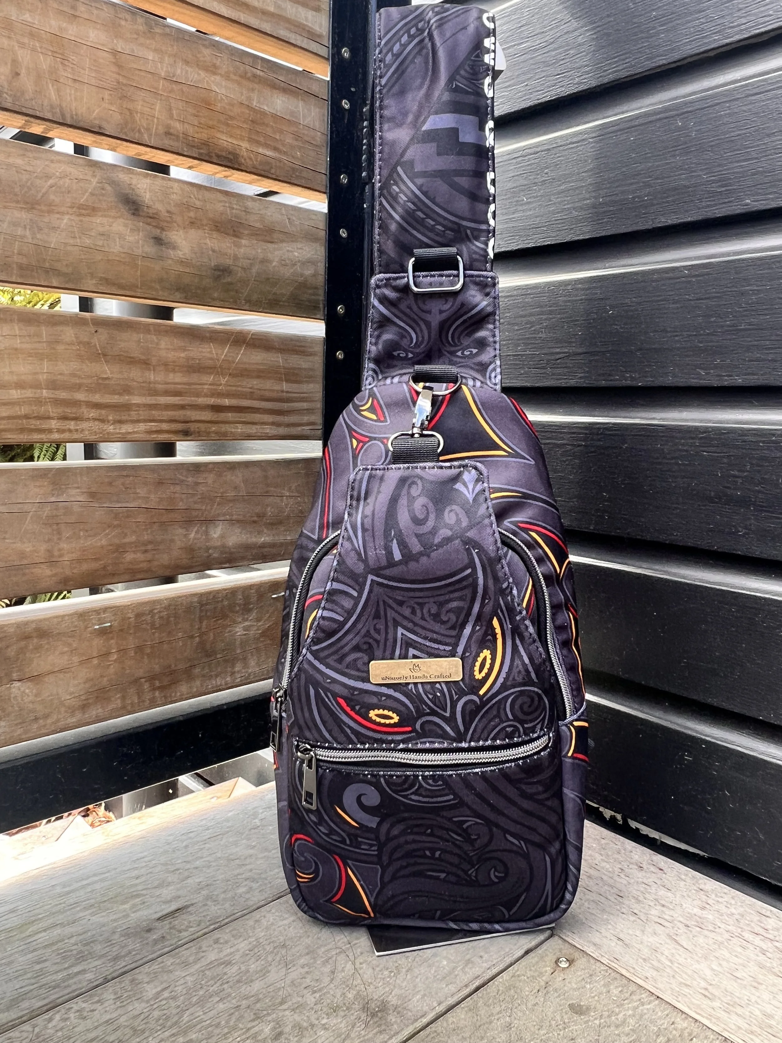 Handcrafted Legacy Re-Crafted backpack created from a treasured Waikato Chiefs rugby jersey featuring taniwha artwork, preserving the original Māori design, team colours and jersey details.