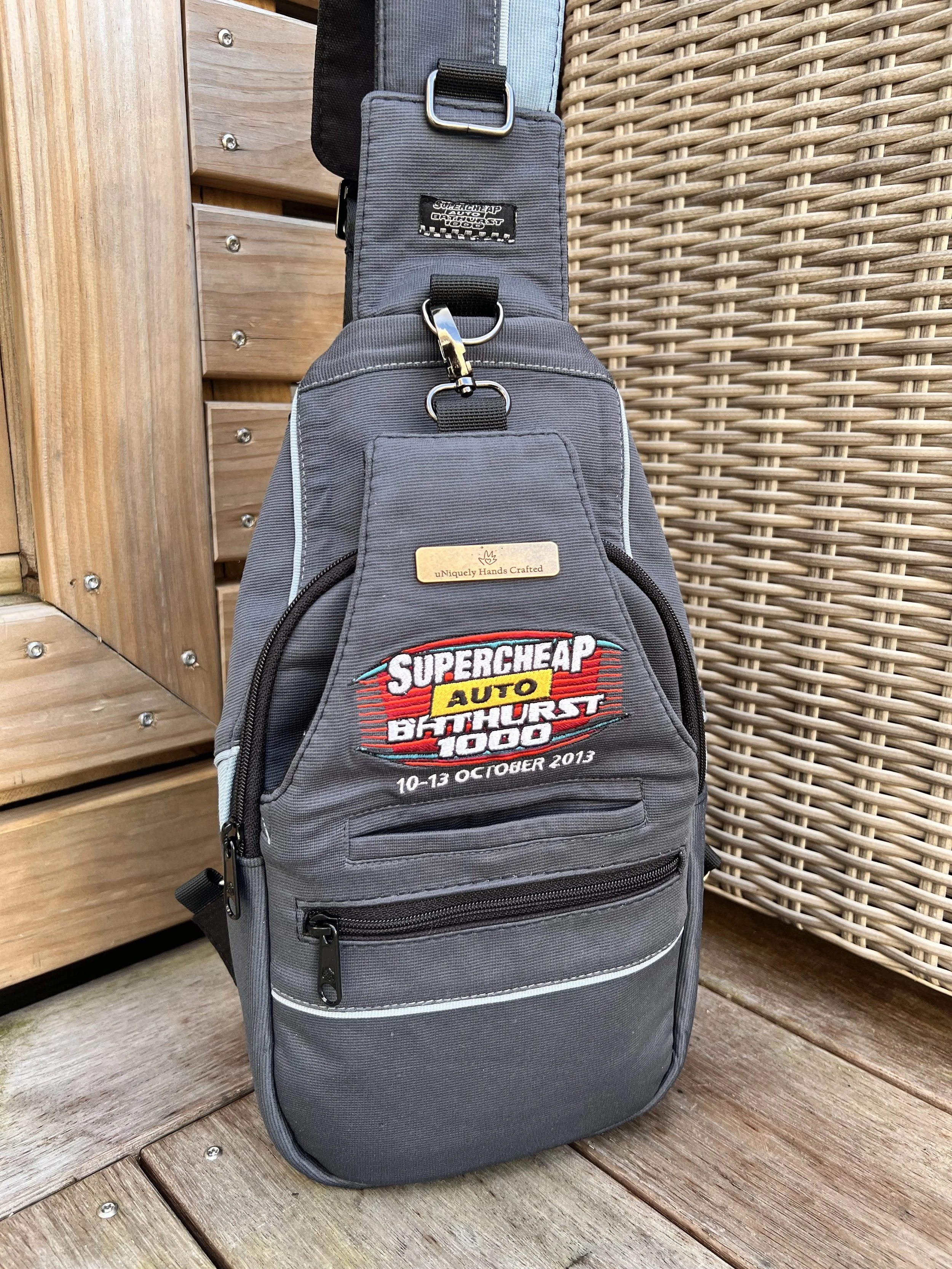 Custom handcrafted sports jersey bag created from a treasured 2013 Bathurst motorsport jersey, as part of the Legacy Re-Crafted Collection.