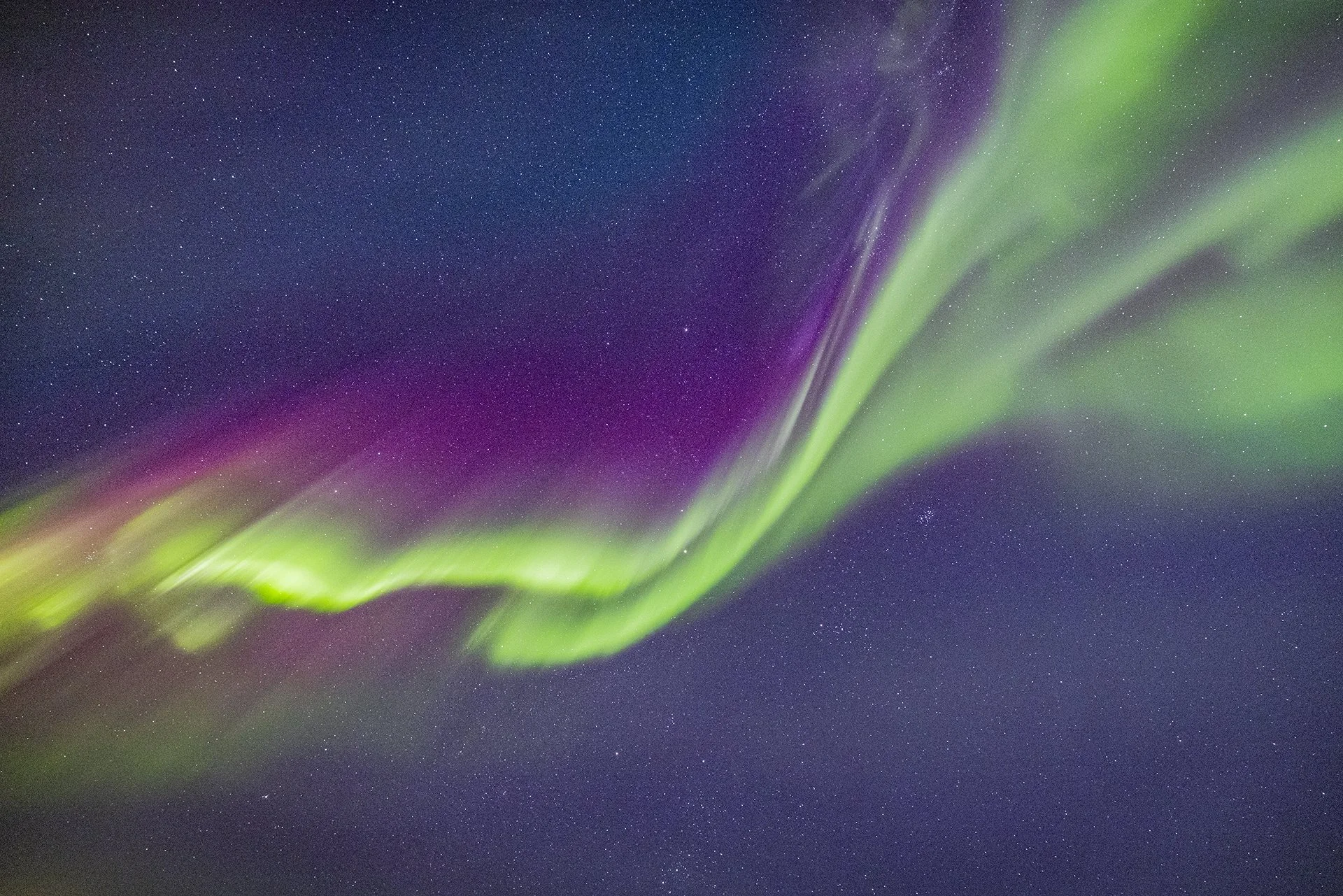 Aurora Borealis dancing across the Arctic sky in Northern Norway.