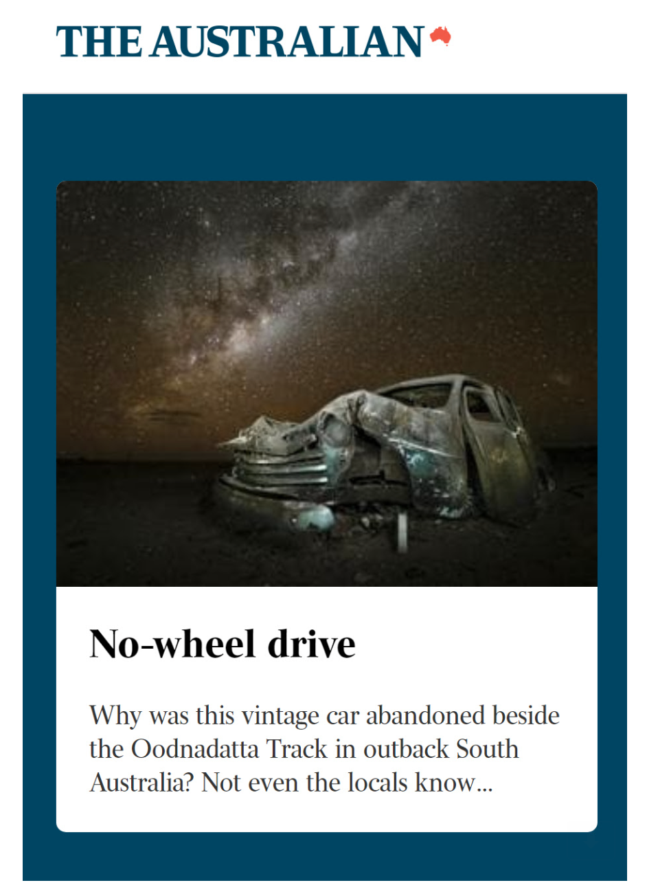 Cover of 'The Australian' magazine featuring an abandoned vintage car in a desert at night under a starry sky with the Milky Way. The headline reads 'No-wheel drive' and the subtext explains the mystery behind the abandoned car beside the Oodnadatta Track in South Australia.