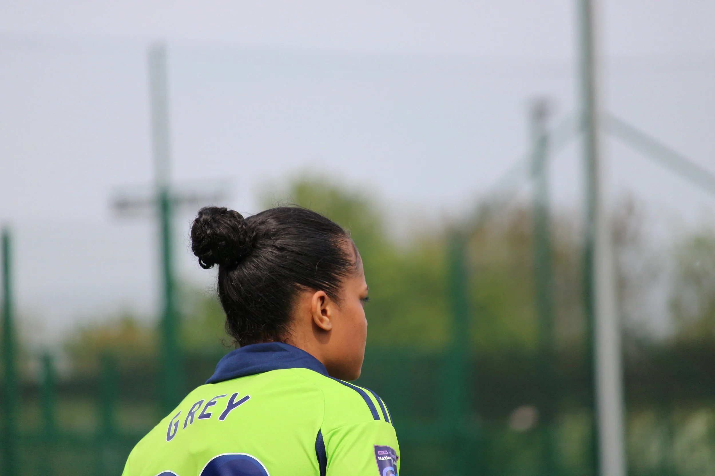 Anna Grey looks down the pitch. 