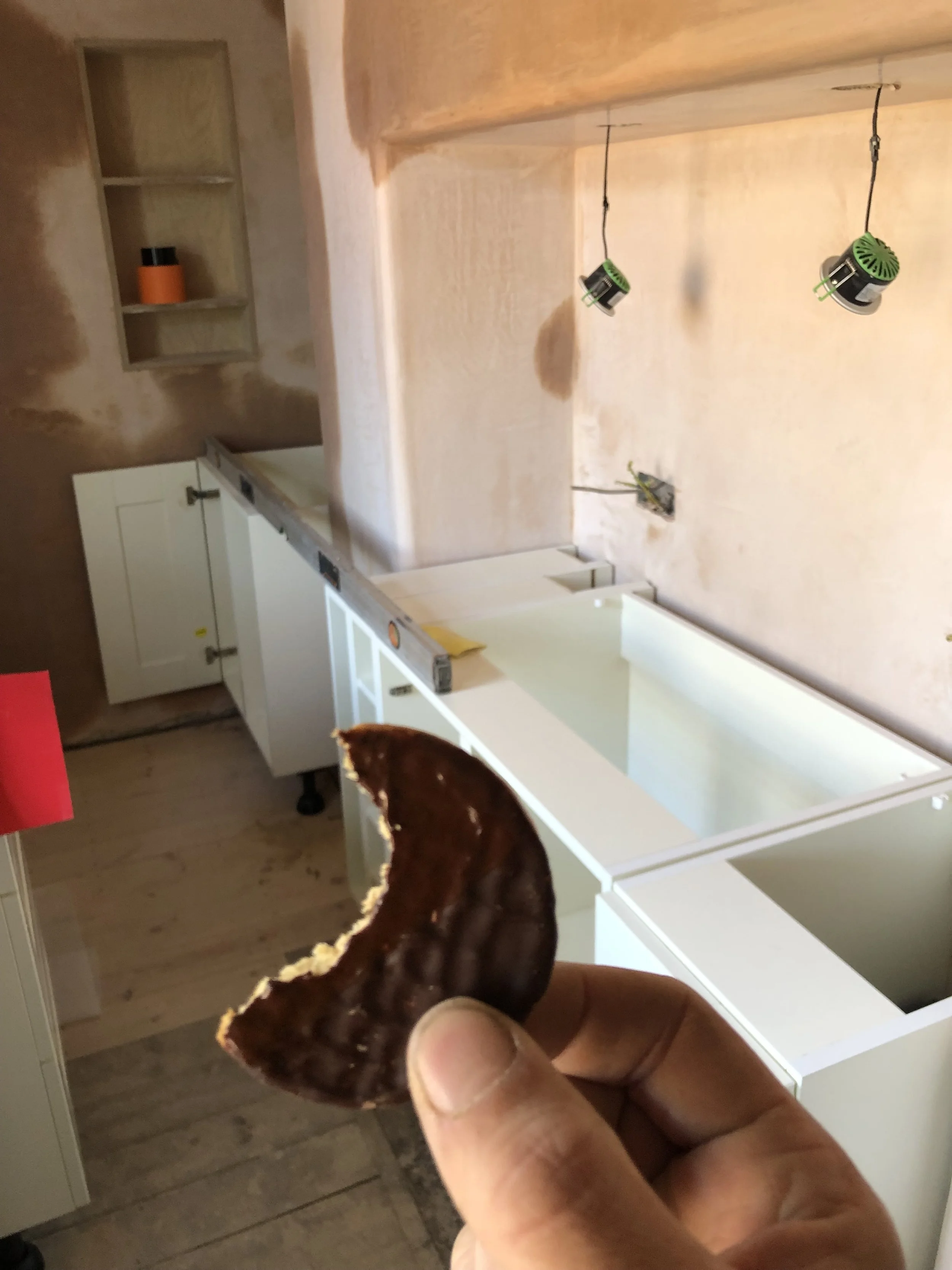 Kitchen fit & tile.
