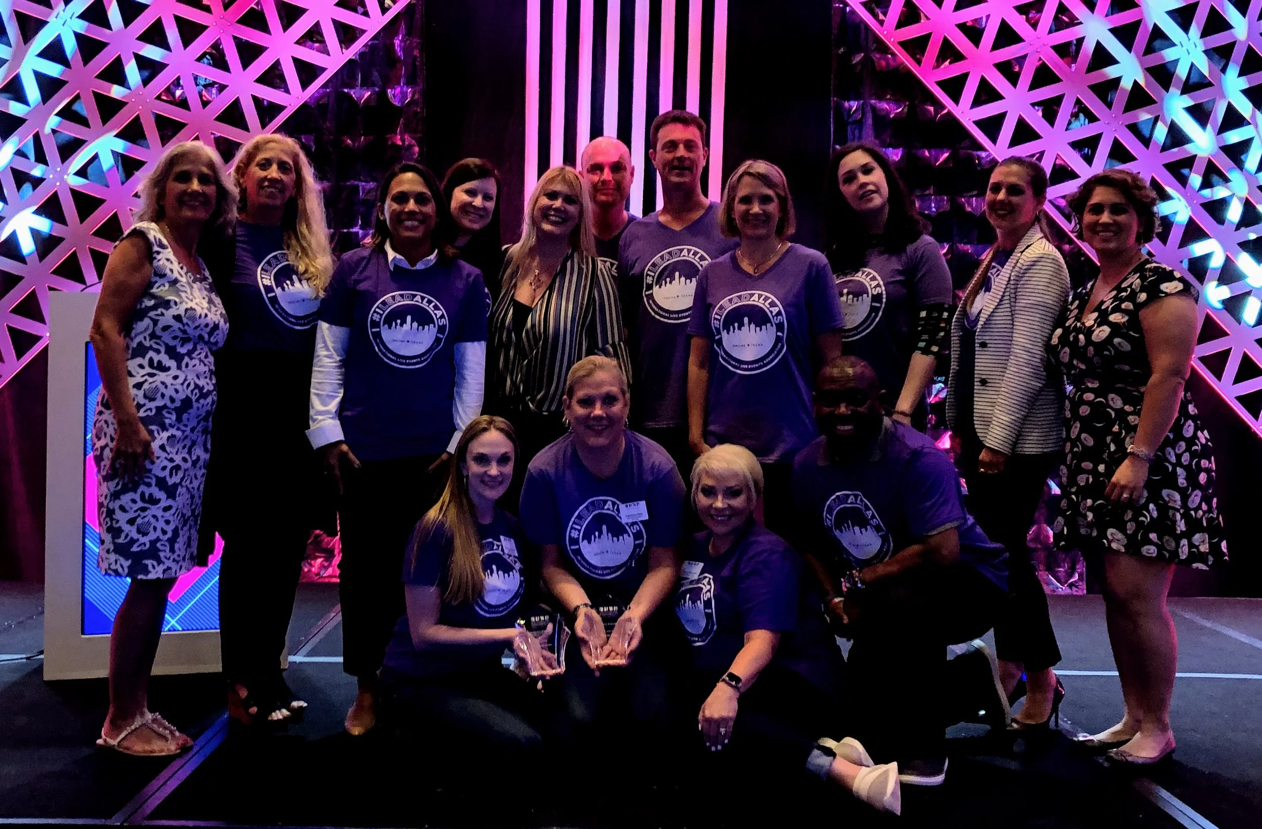Event production professionals gathered at an industry event, reflecting a strong network of trusted collaborators and production specialists.