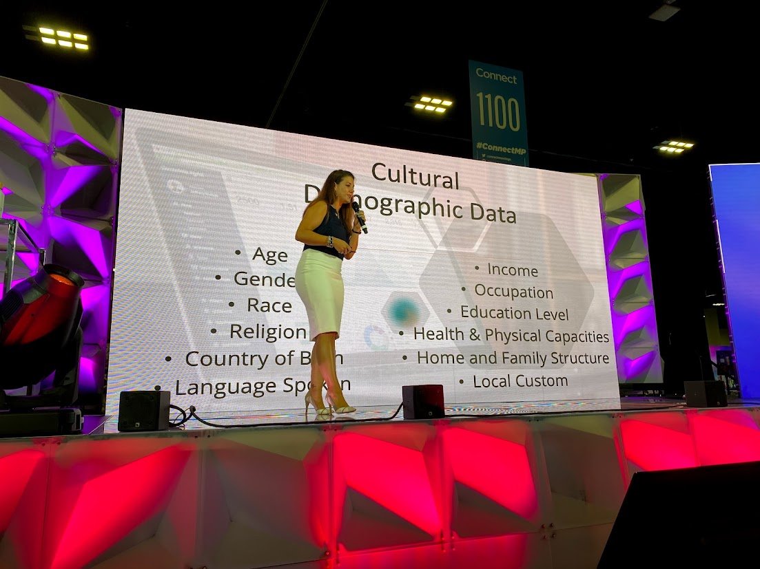 Event production professional presenting on stage, representing industry-certified expertise in corporate event planning and live event production.