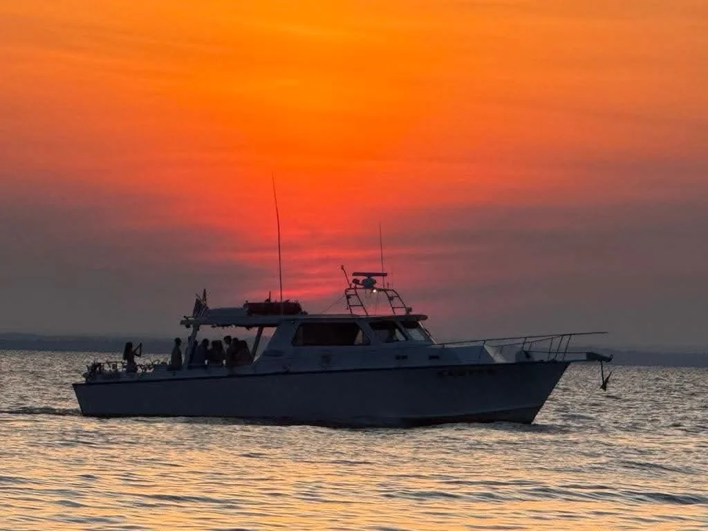 Charter boat Sawyer basks in the sunset on an Elligail Charters excursion