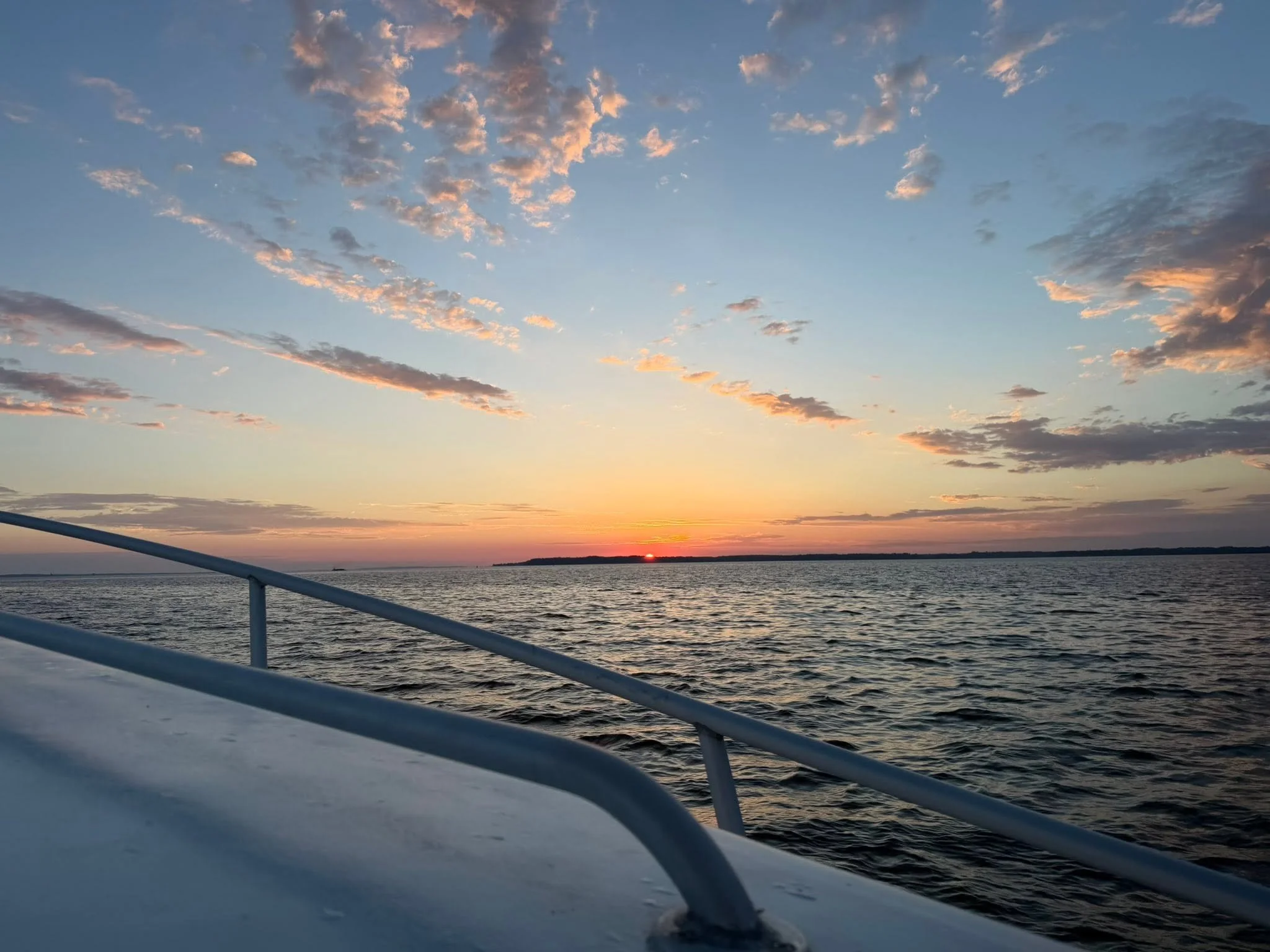 Sunset over the Chesapeake Bay on an Elligail Charters toue