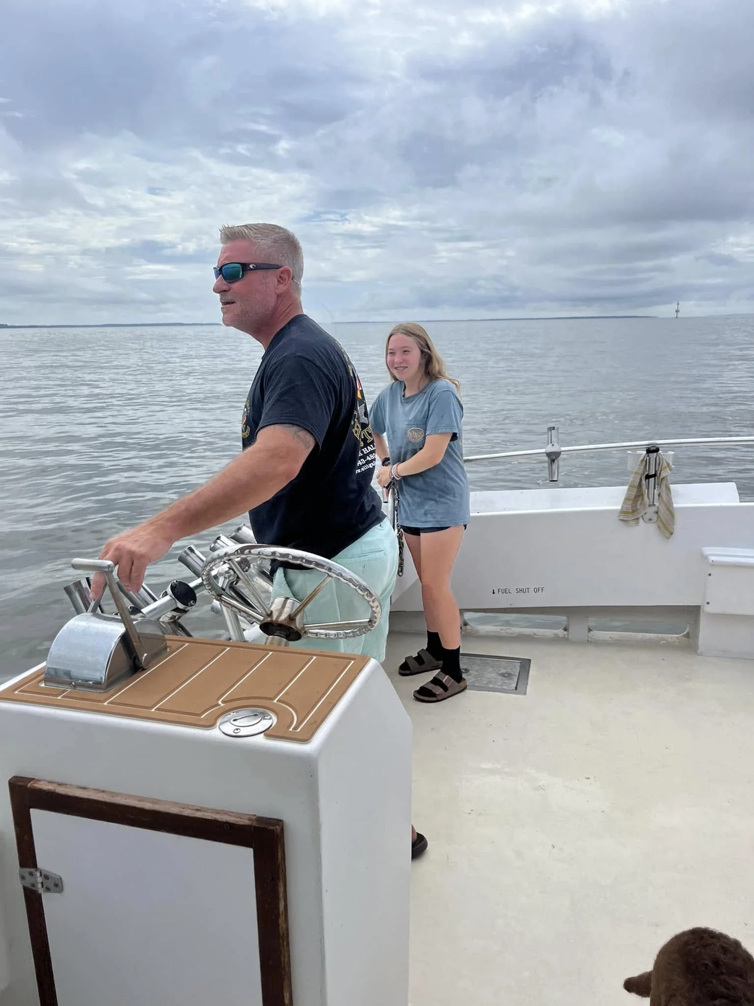 Photo of Captain Chuck Woodfield and his daughter