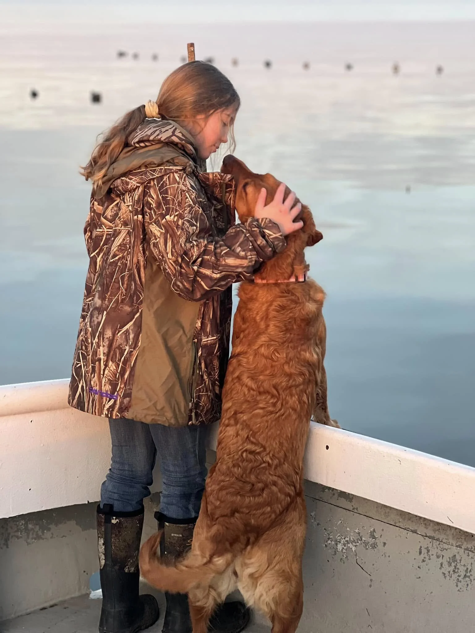 Bonding time with a pup on an Elligail Charters excursion