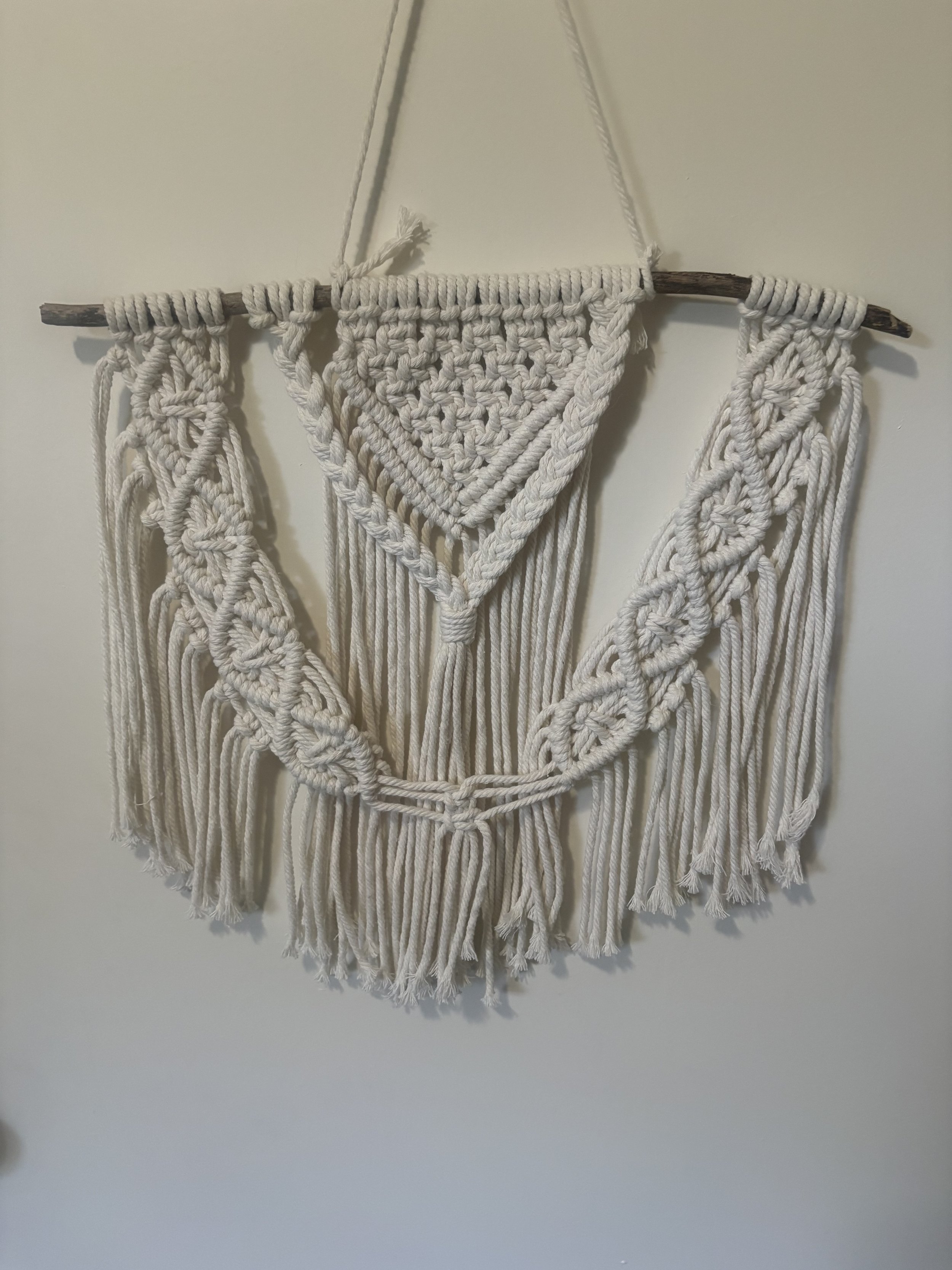 Forest Path Wall Hanging
(16" x 16")
Featuring woven patters, decorative detailing, and flowing fringe, this piece adds texture and character to any wall. A striking accent inspired by natural forms and organic design.
$80.00