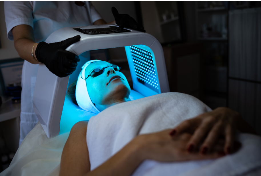 Client receiving facial LED skin therapy