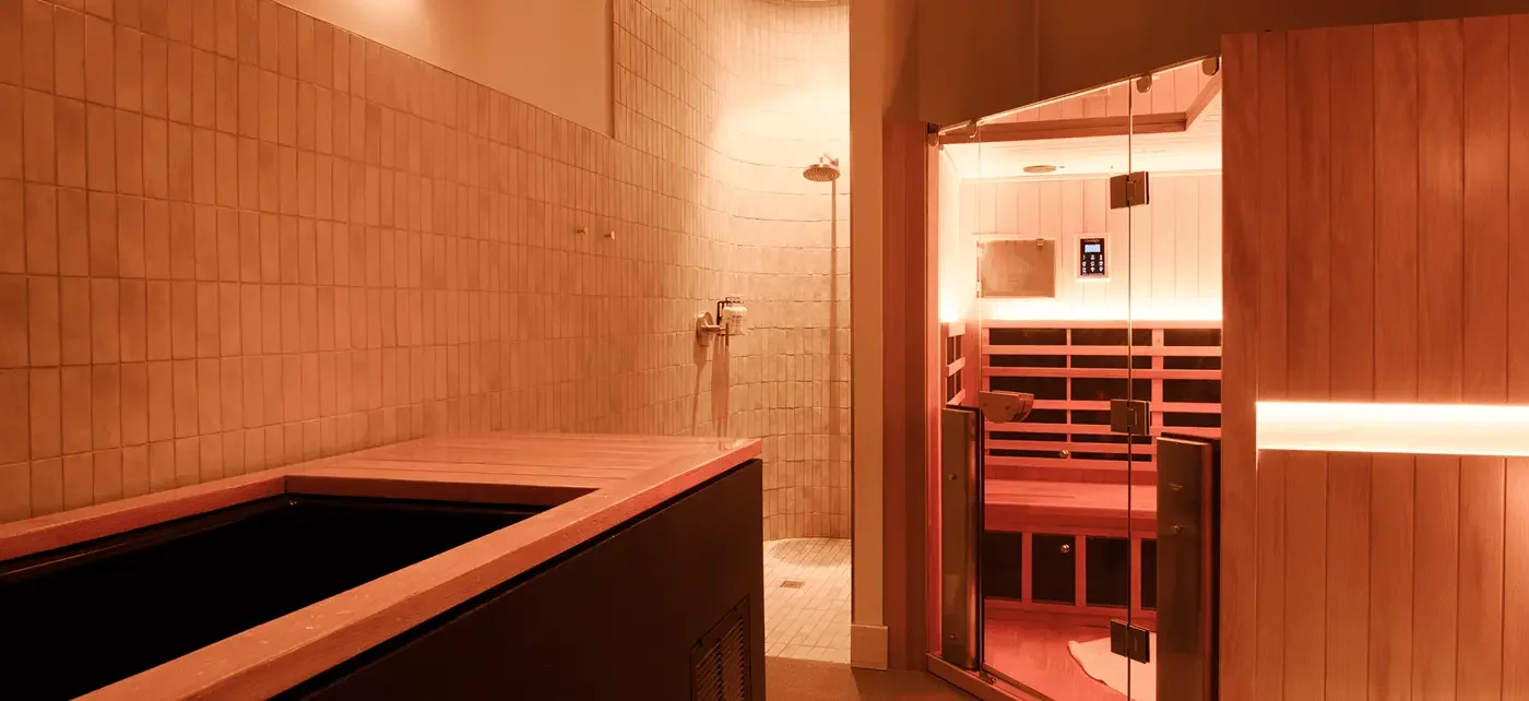 Contrast therapy room with infrared sauna and cold plunge