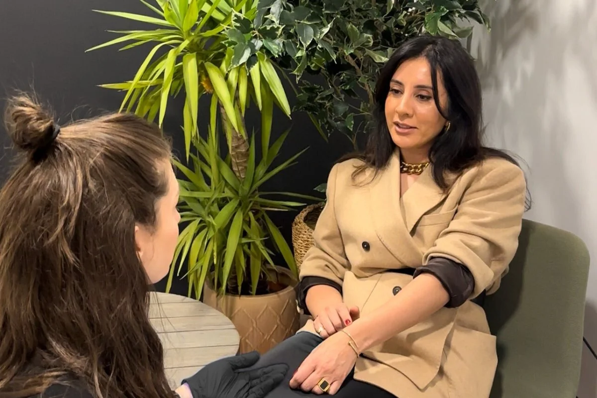 Wellness consultant speaking with a client