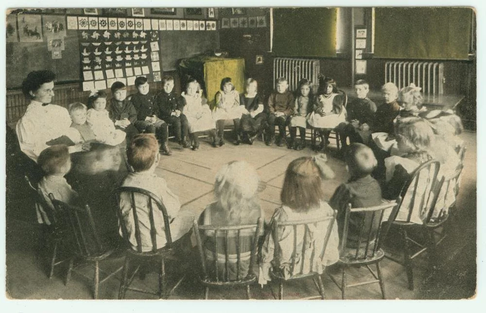 Children seated in a circle at the Lake Bluff Children’s Home