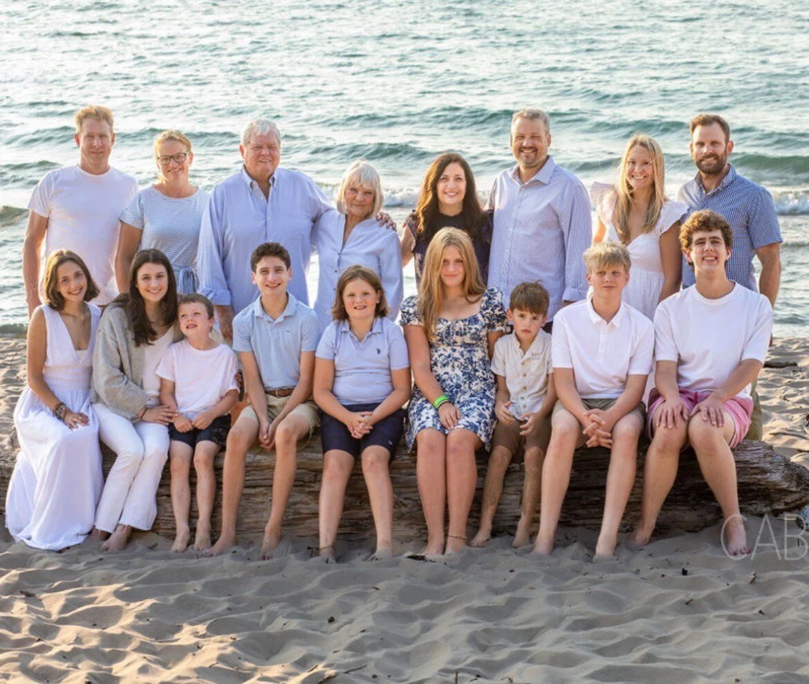 The Heintzelman family gathered on the shore of Lake Michigan.