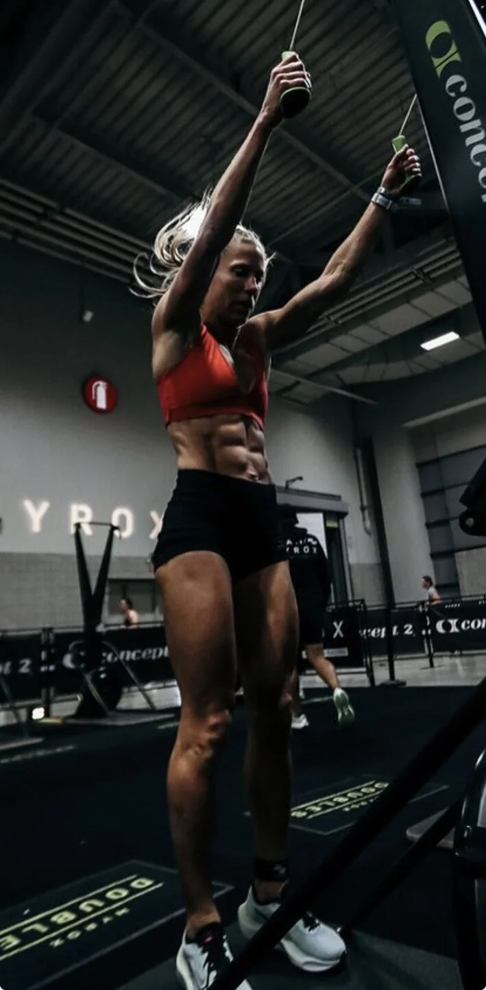 Anne Marie McNiven competing in a HYROX fitness race.