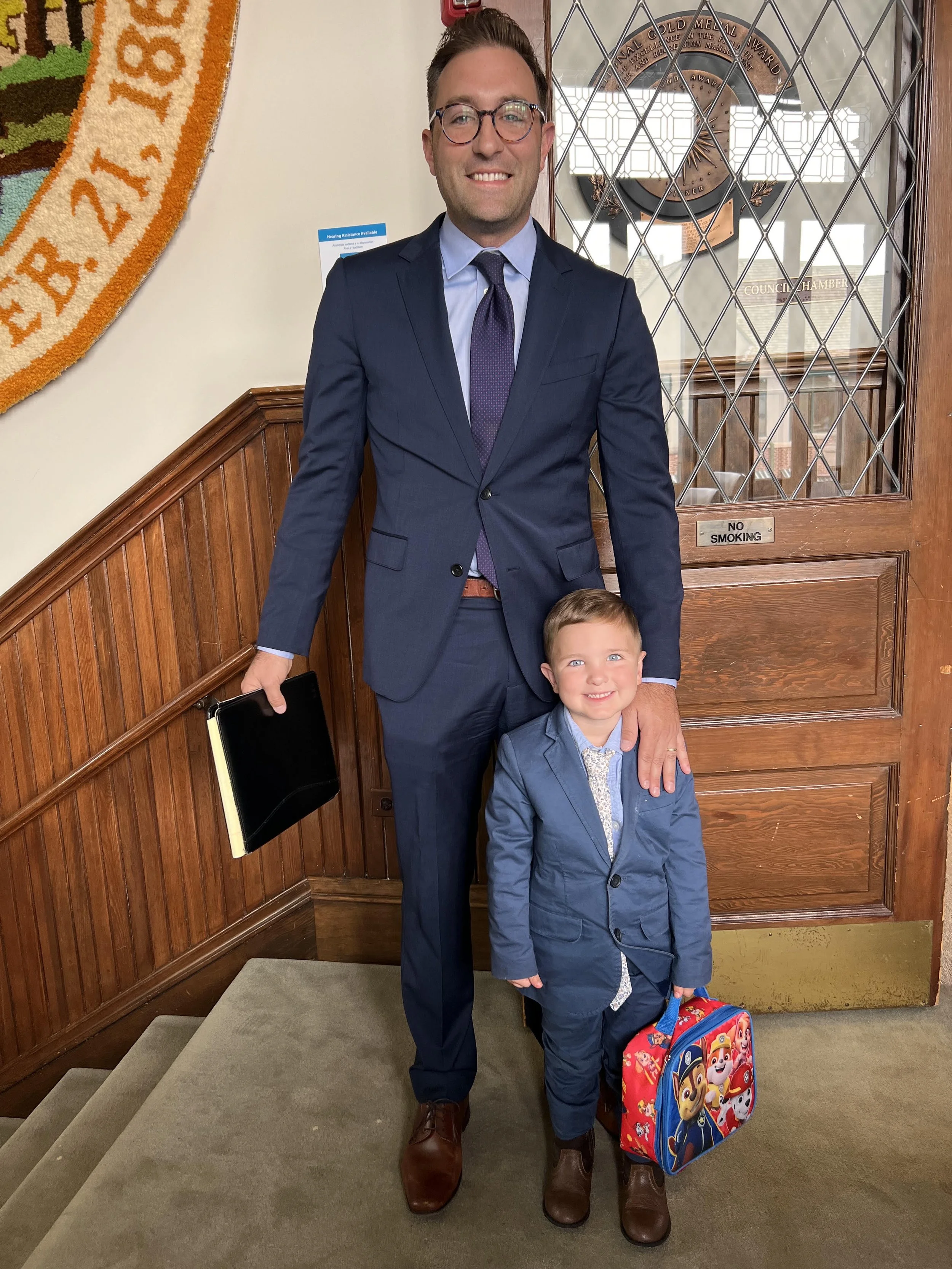 Michael Kopsick with his son Carter, dressed for court.