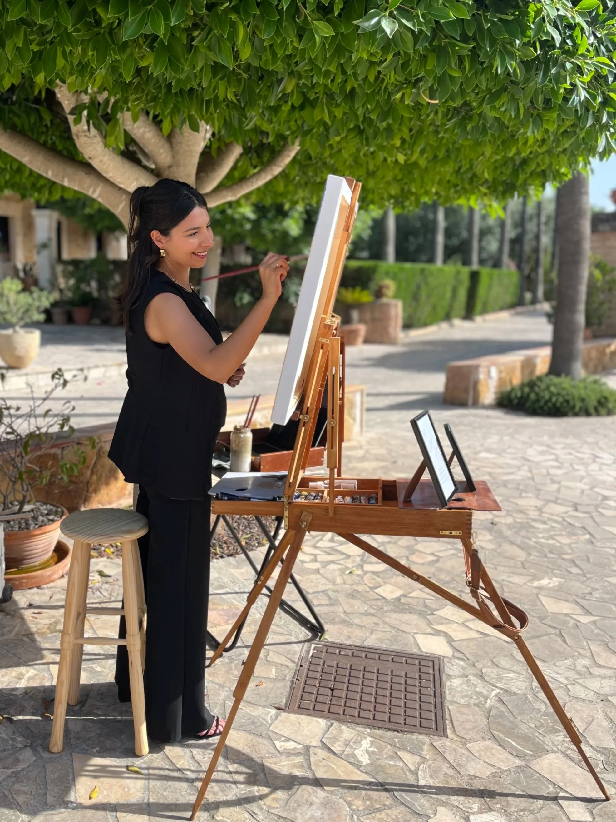 Live painter capturing wedding reception in Son Moli Country House, Mallorca, Spain